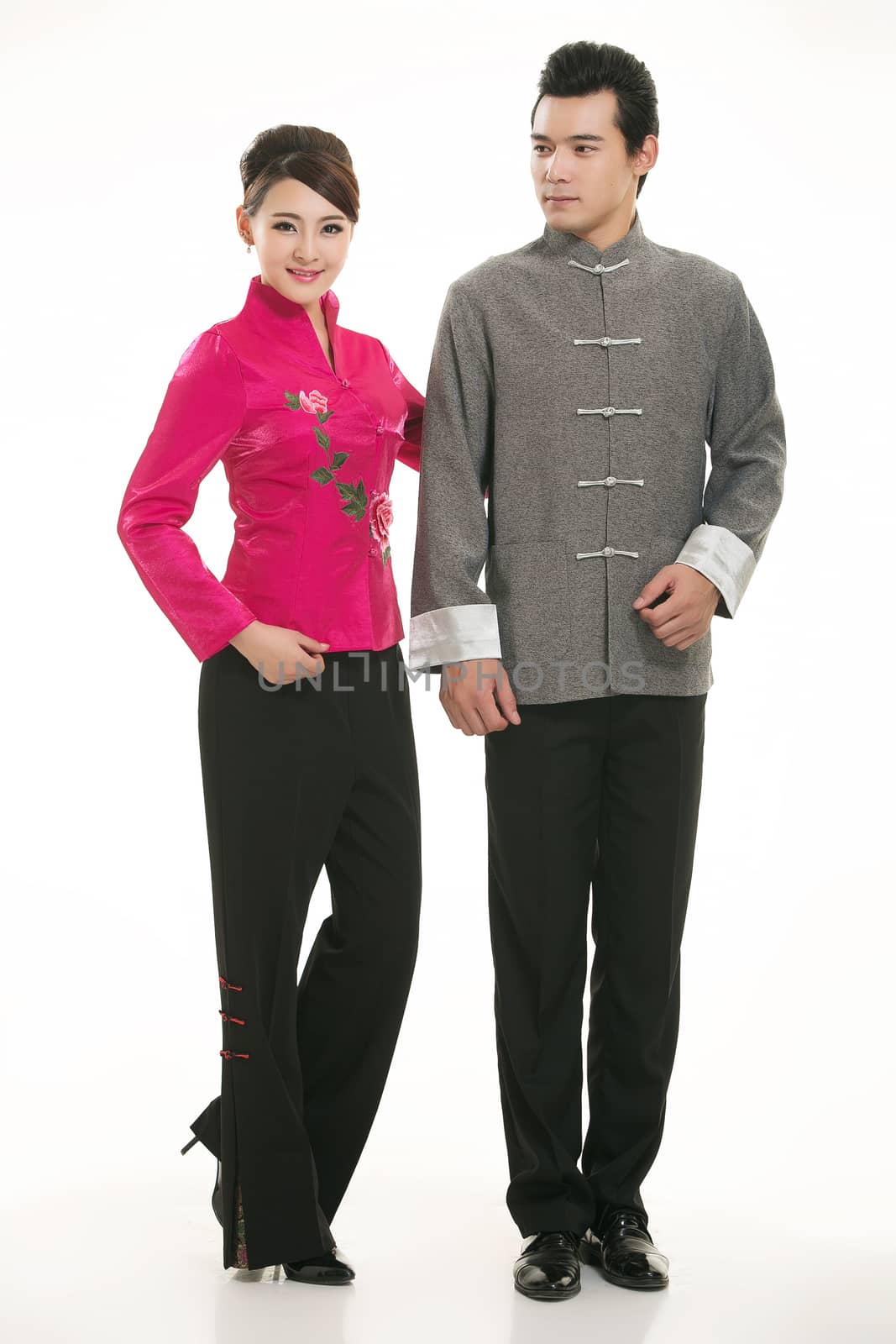 Wearing Chinese clothing waiter in front of a white background