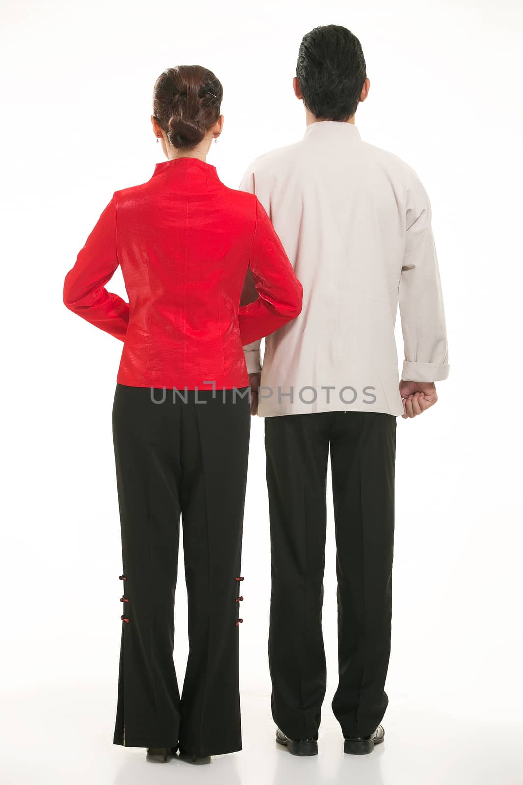 Wearing Chinese clothing waiter in front of a white background