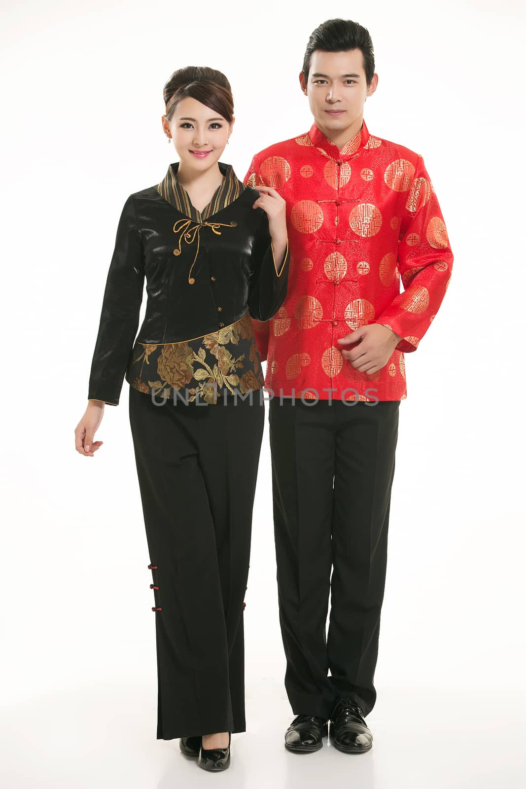 Wearing Chinese clothing waiter in front of a white background