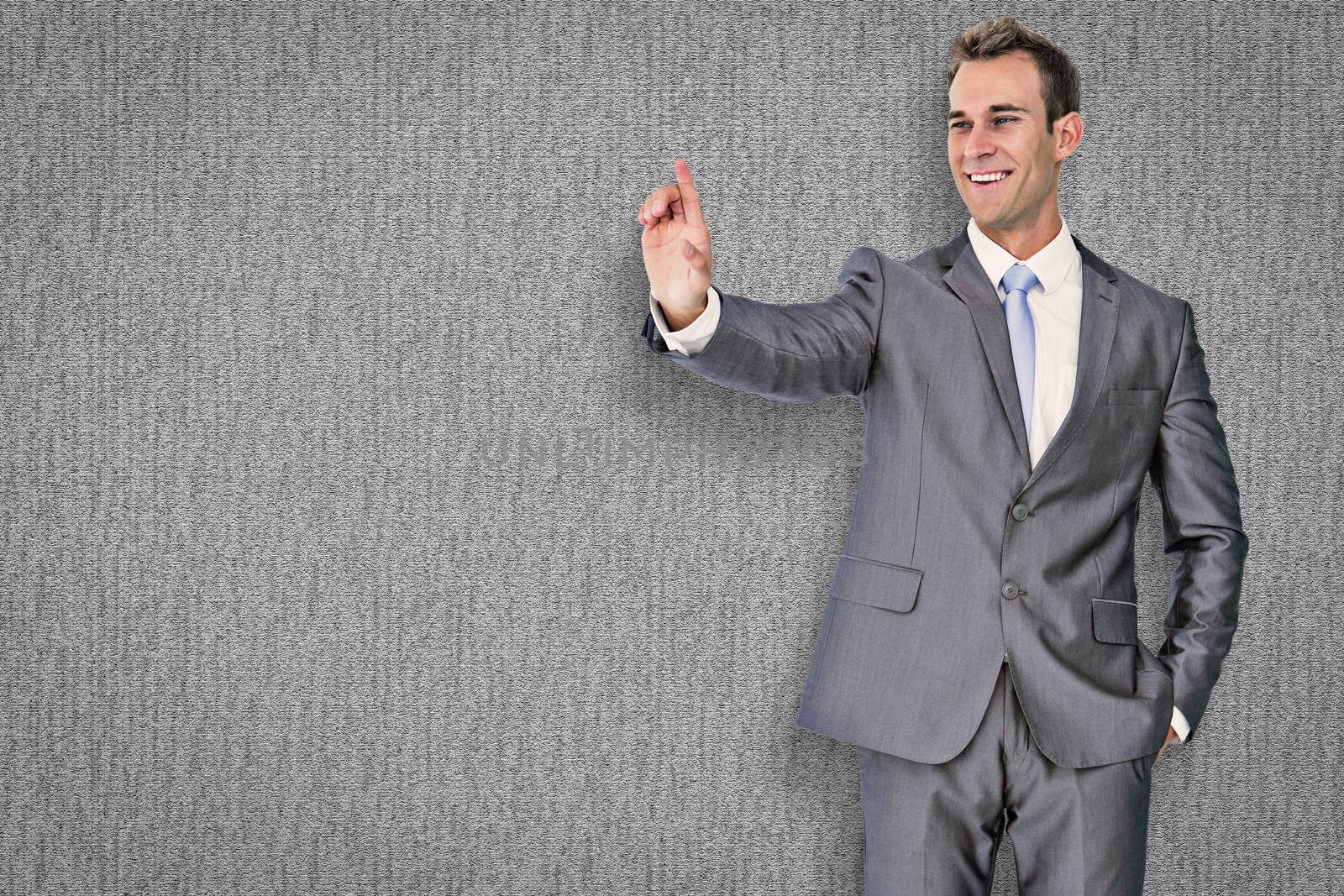 Composite image of businessman pointing by Wavebreakmedia
