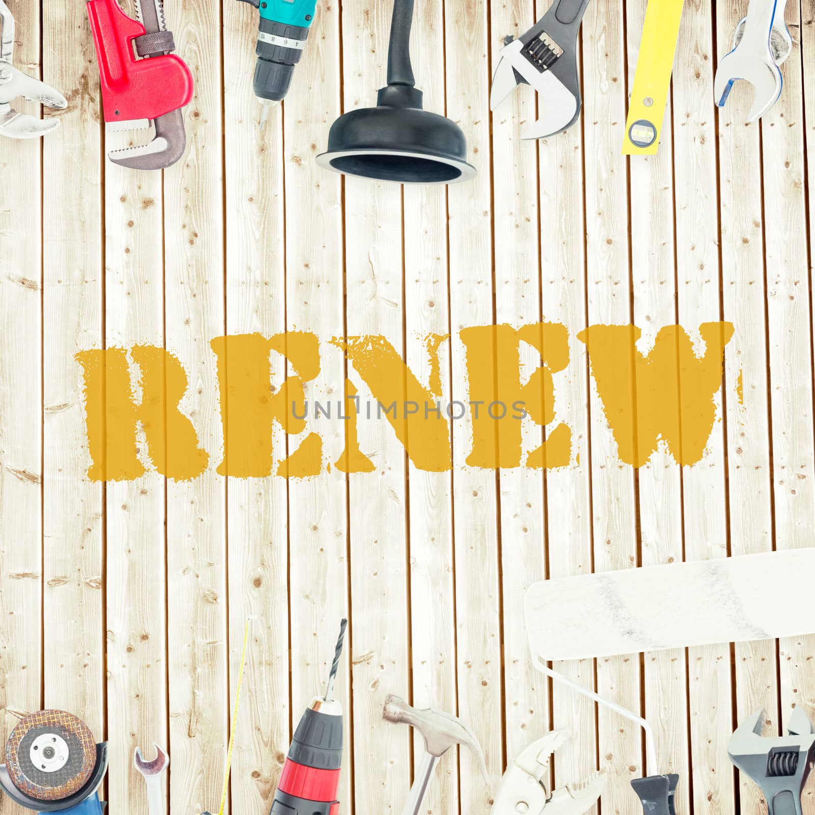 Renew against tools on wooden background by Wavebreakmedia