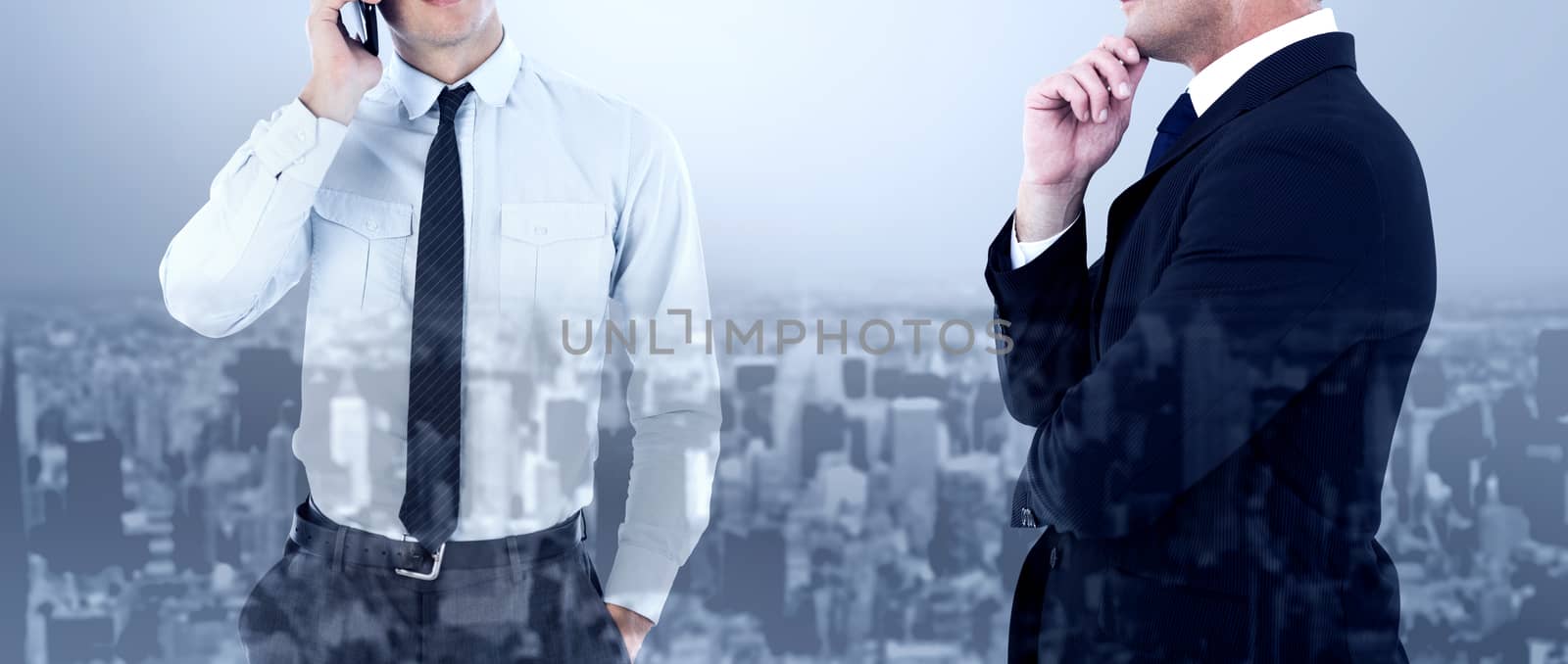 Elegant businessman in suit posing  against high angle view of city