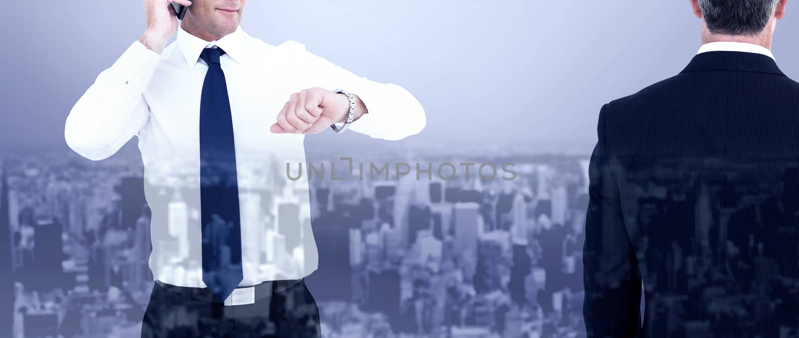 Rear view of an elegant businessman  against high angle view of city