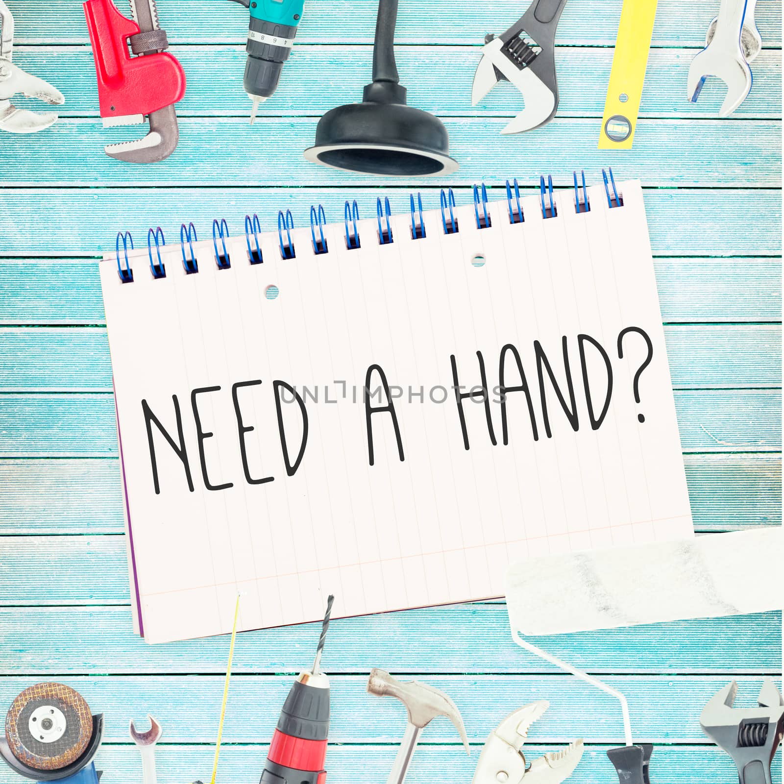 The word need a hand? against tools and notepad on wooden background