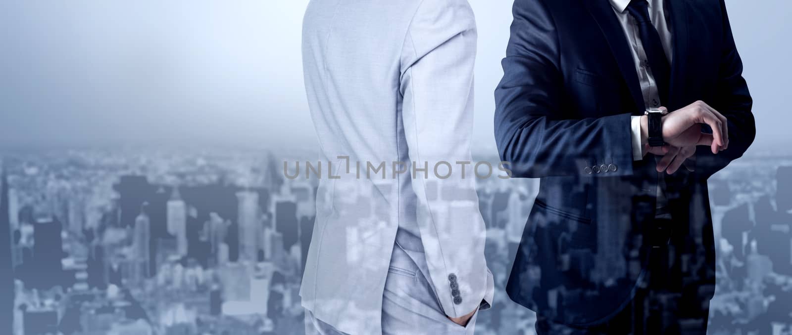 Thinking businessman against high angle view of city