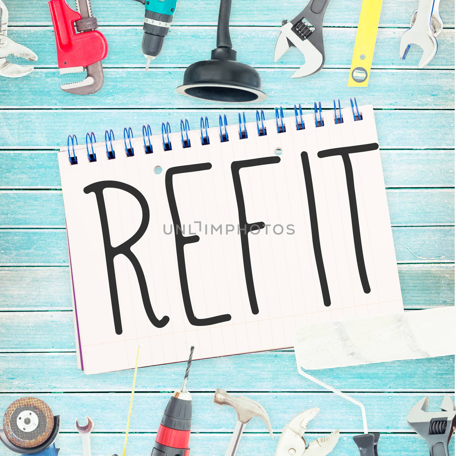 The word refit against tools and notepad on wooden background