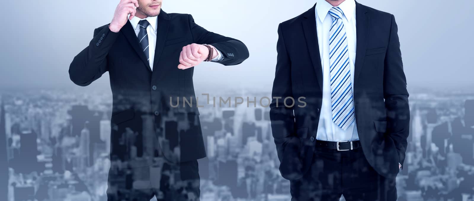 Smiling elegant businessman with hands in pockets against high angle view of city