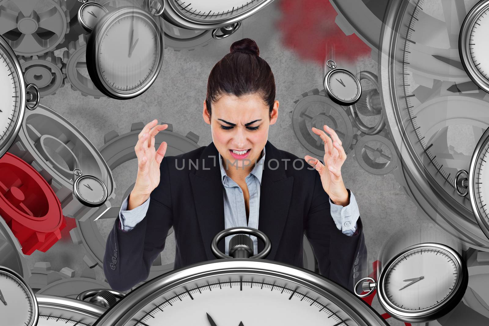 Angry businesswoman gesturing against grey background