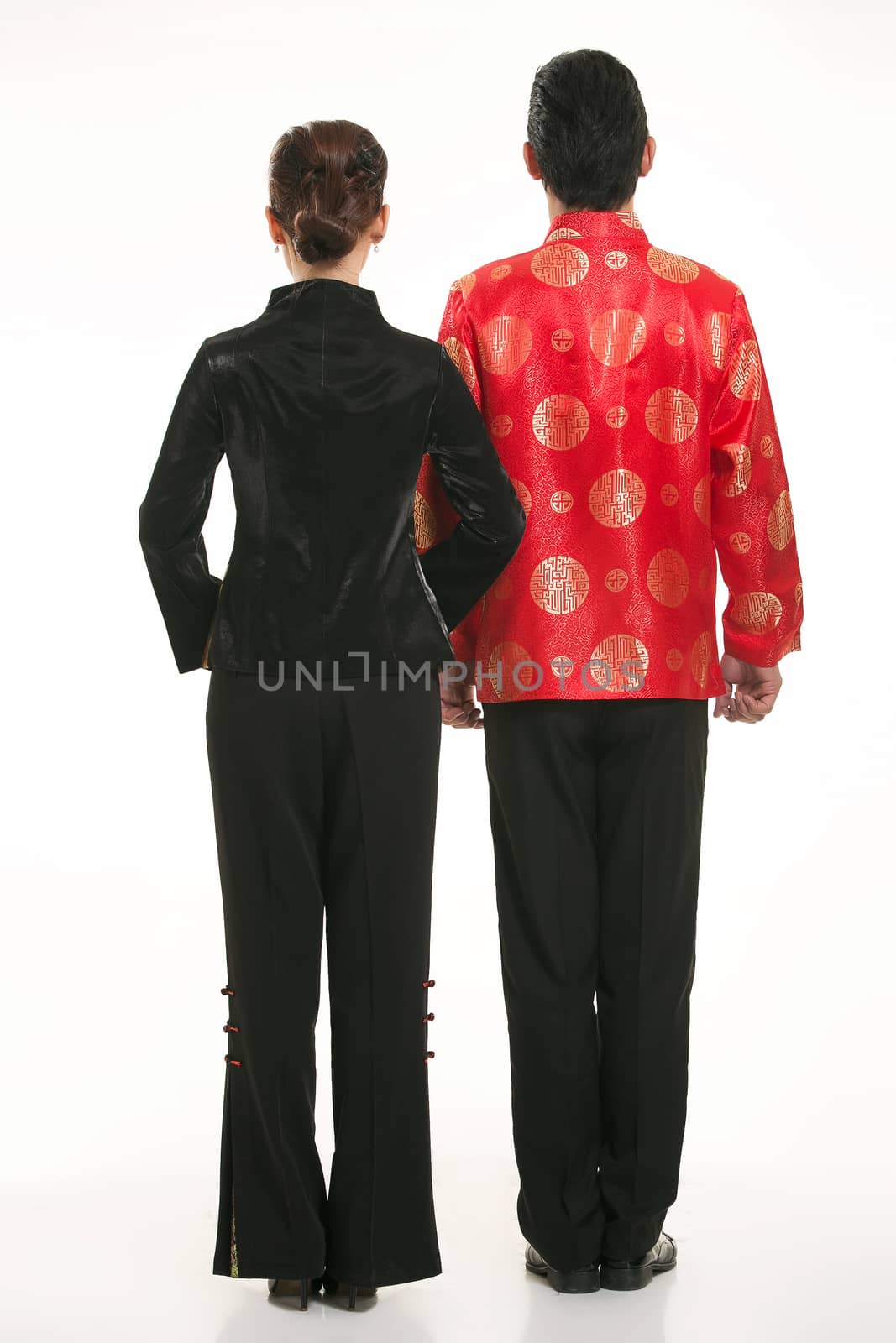 Wearing Chinese clothing waiter in front of a white background