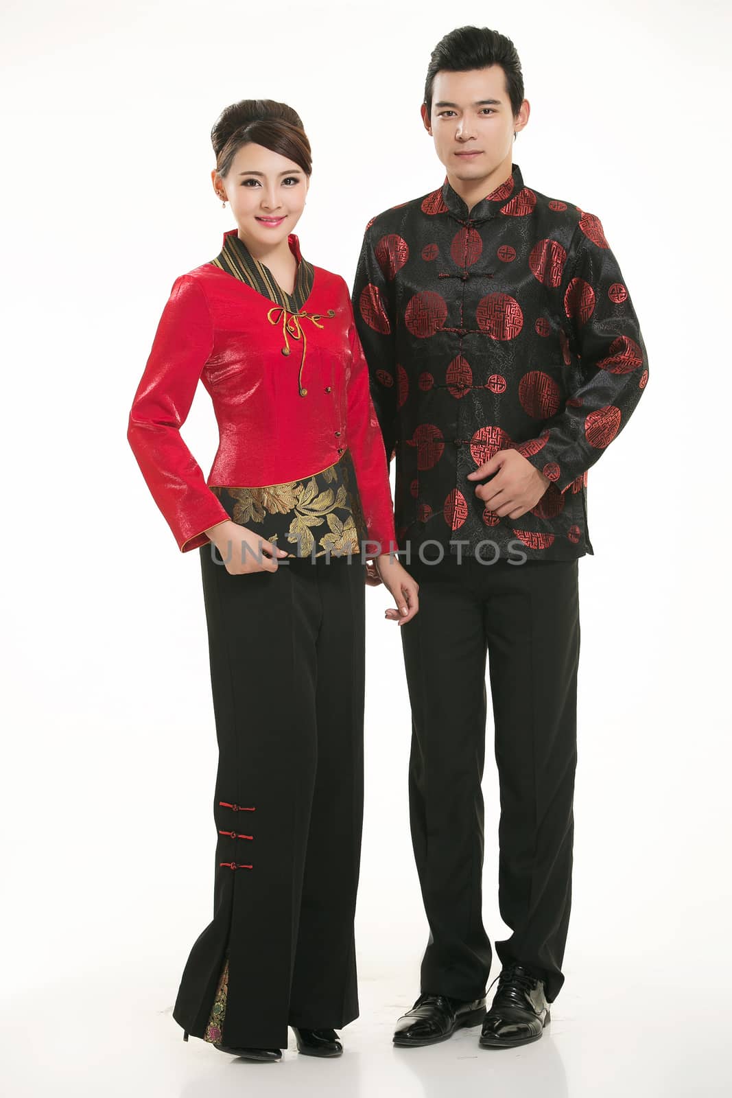 Wearing Chinese clothing waiter in front of a white background