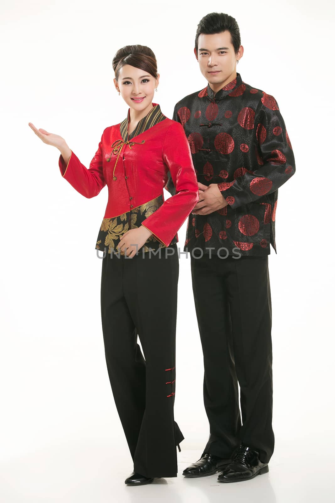 Wearing Chinese clothing waiter in front of a white background