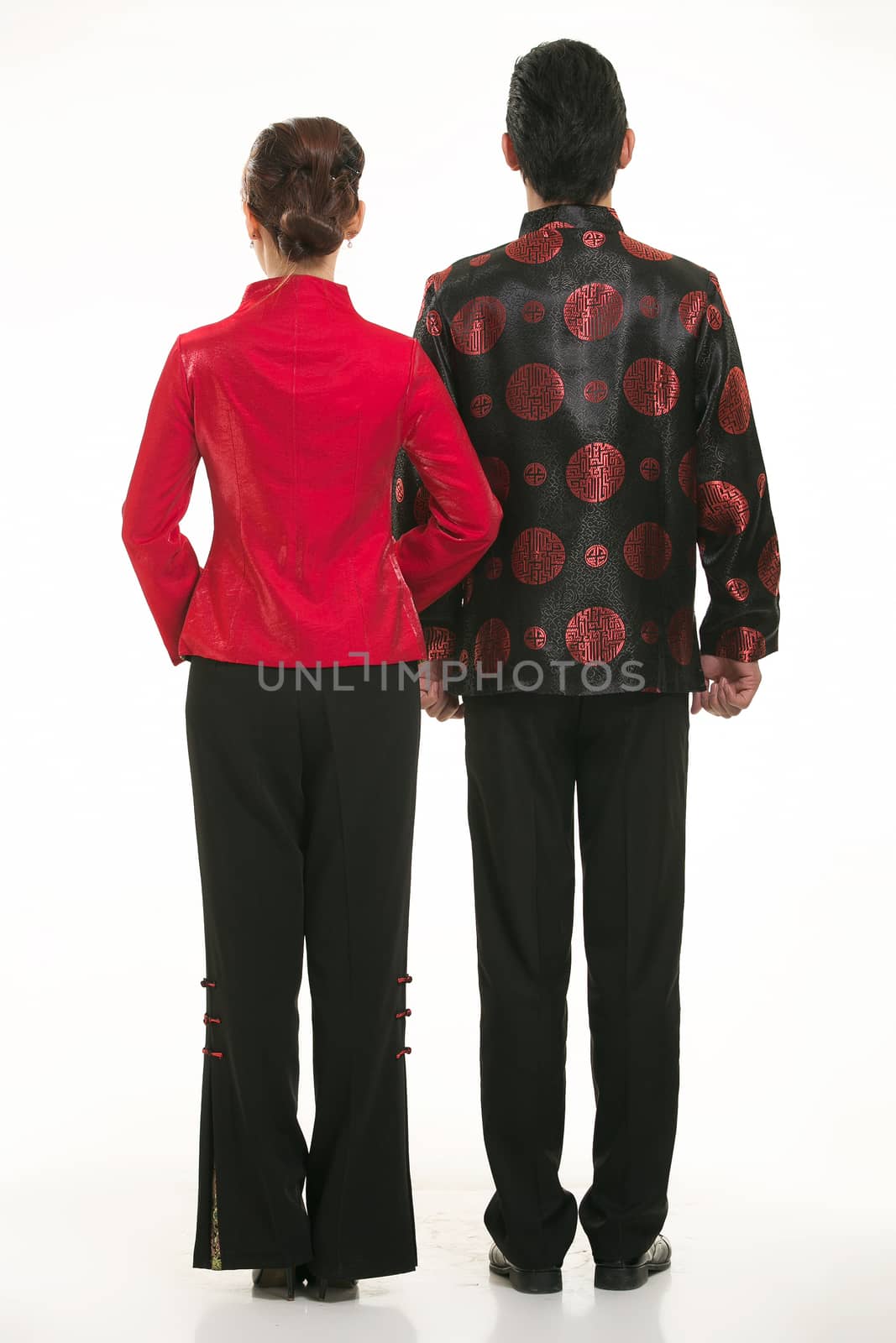 Wearing Chinese clothing waiter in front of a white background