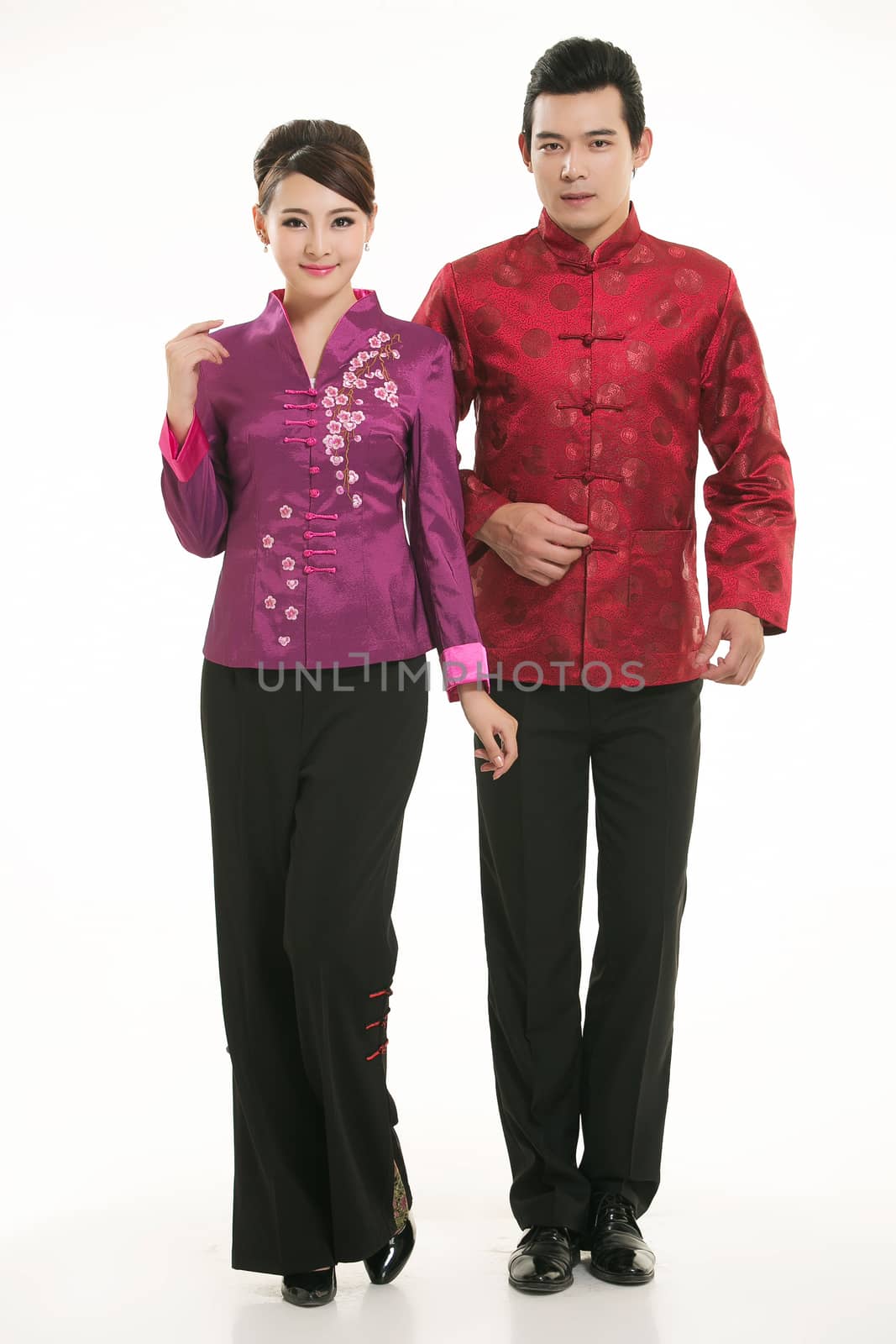 Wearing Chinese clothing waiter in front of a white background