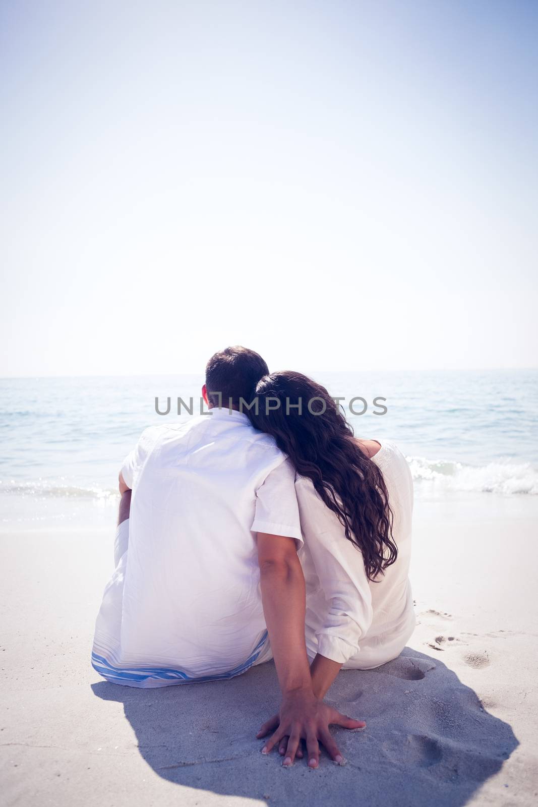 Romantic couple on the beach on a sunny day