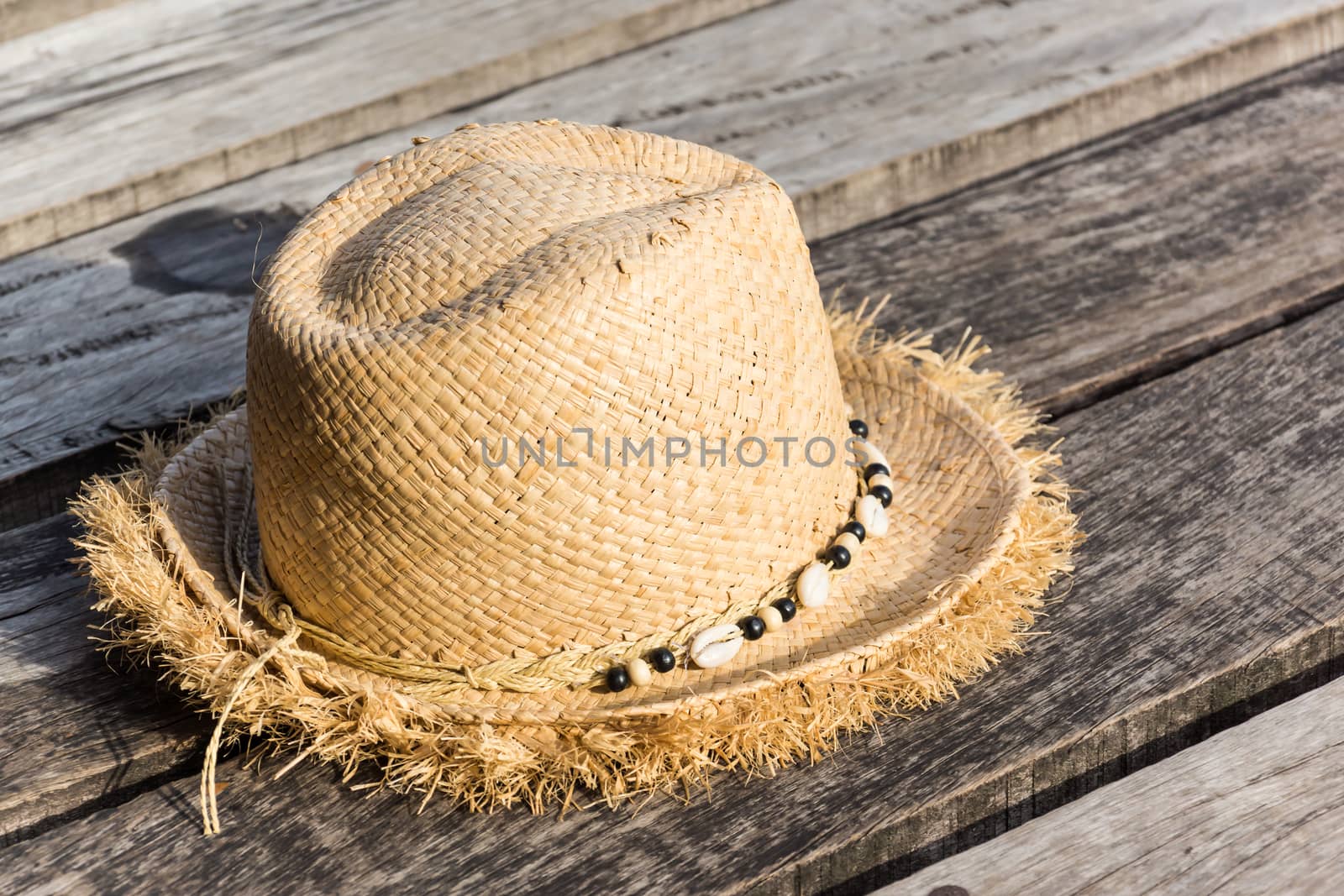 beautiful hat placed on wood ground