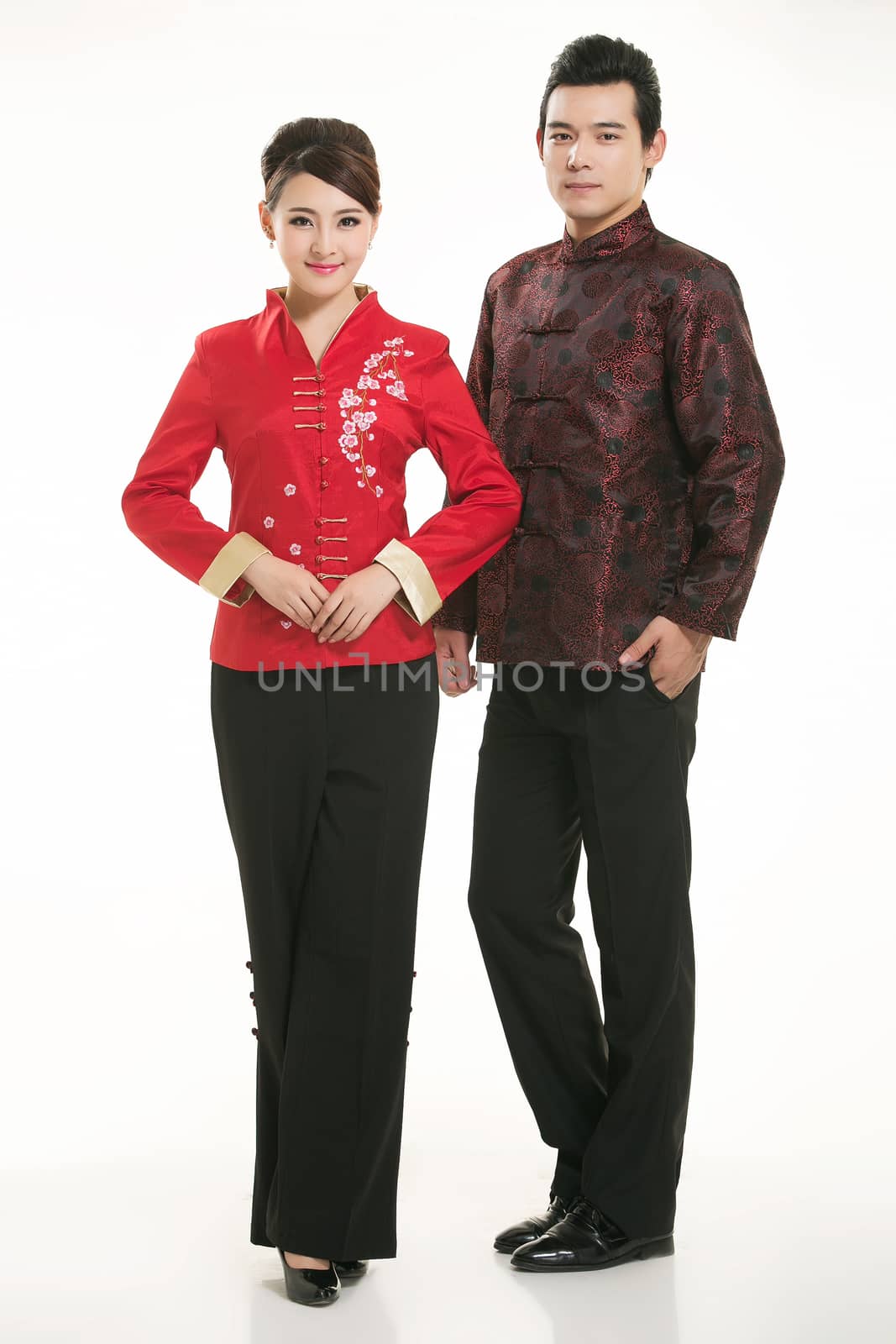 Wearing Chinese clothing waiter in front of a white background