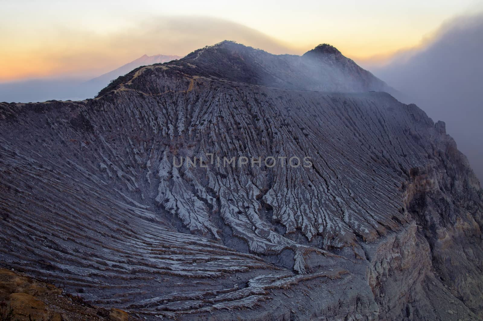 Ijen volcano in East Java in Indonesia. It's famous for sulfur mining and acid lake.