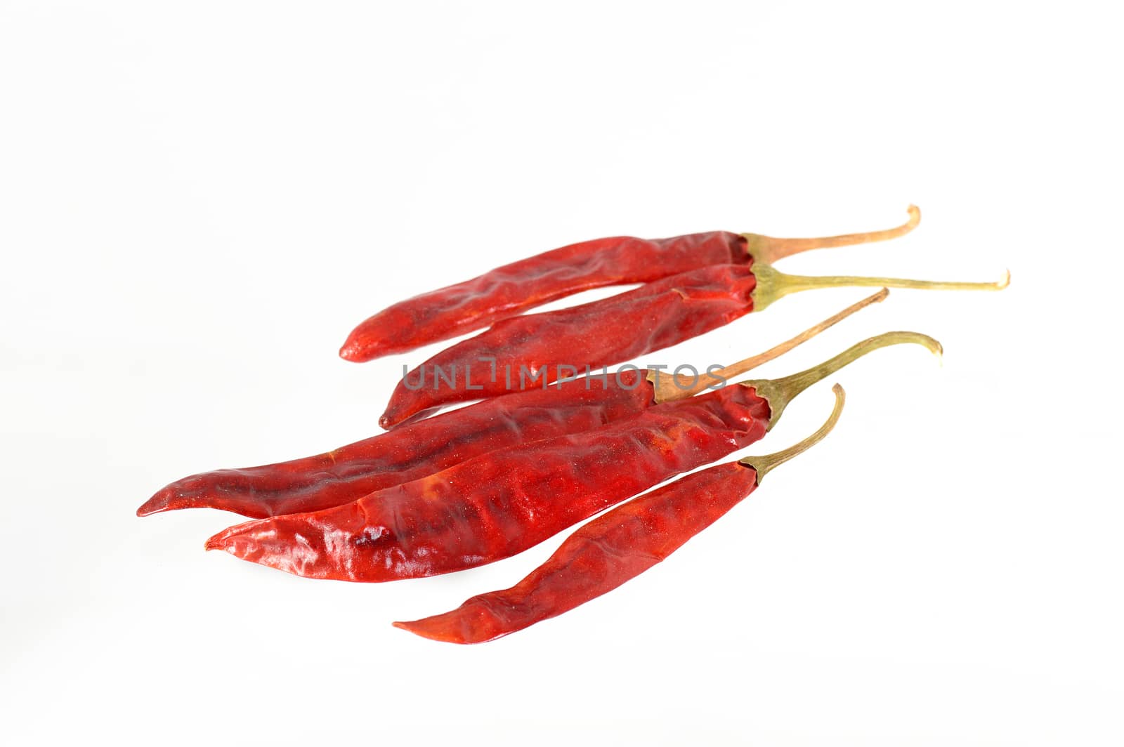 Red Chilli peppers isolated on white background