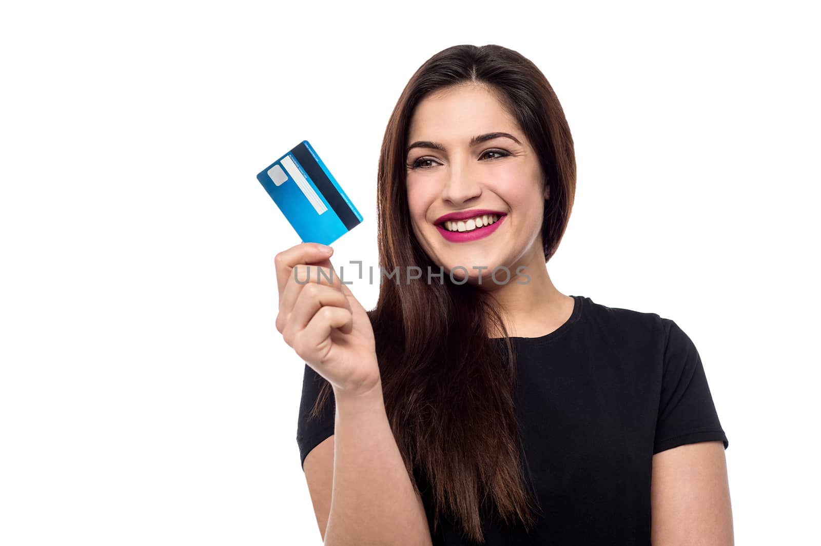 Smiling young woman holding credit card