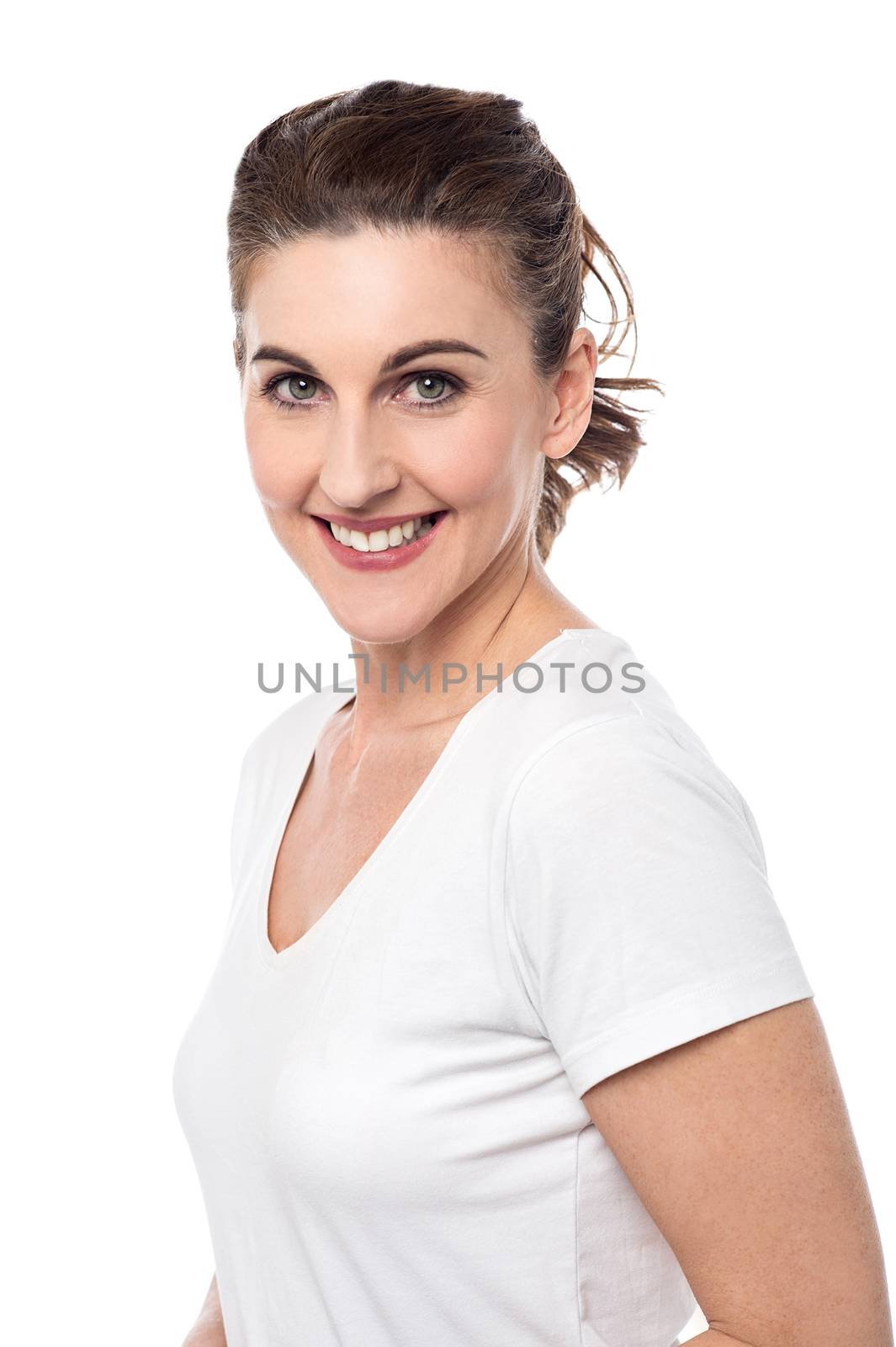 Pretty woman with welcoming smile by stockyimages