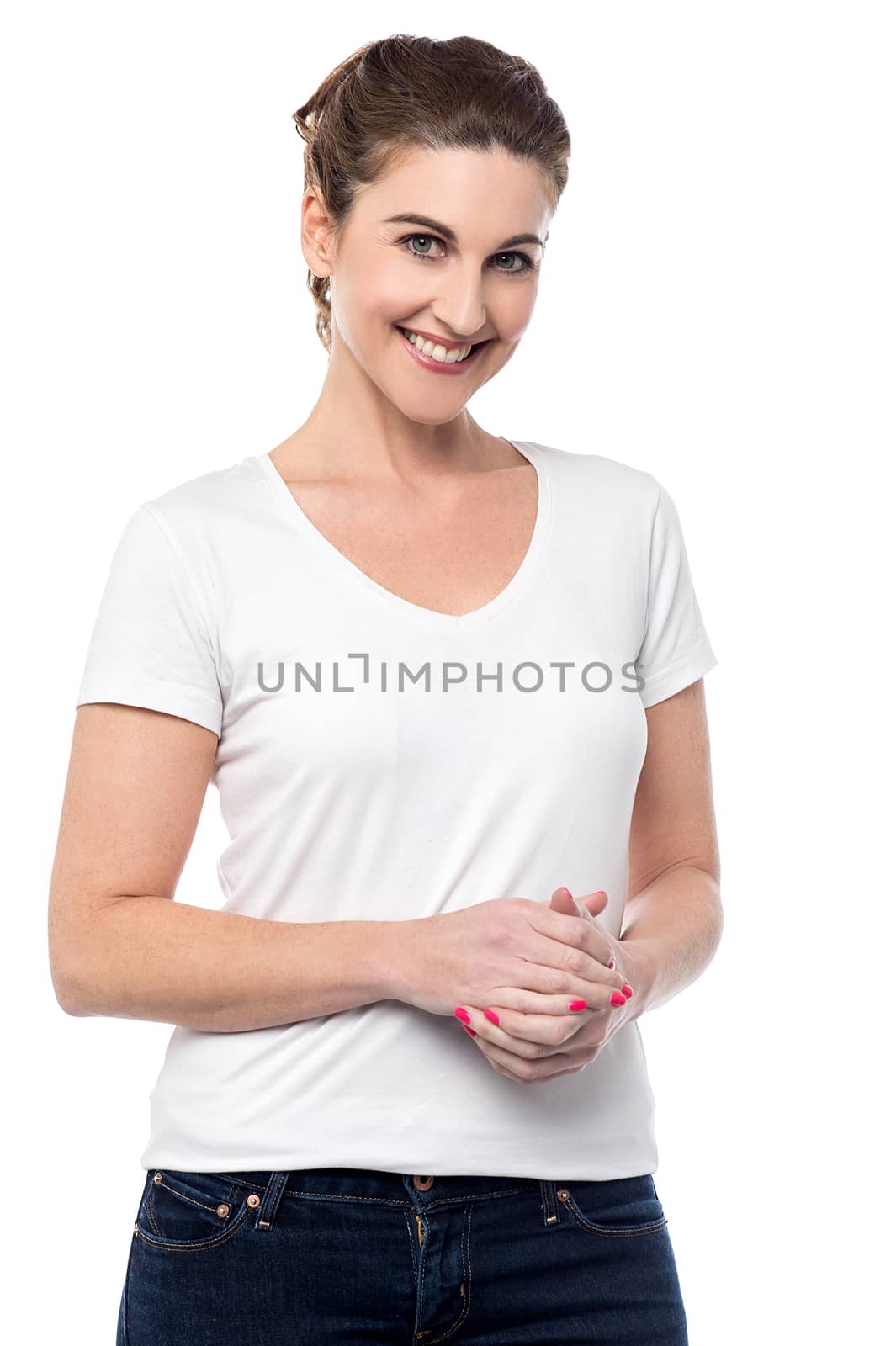 Middles aged woman posing with clasped hands