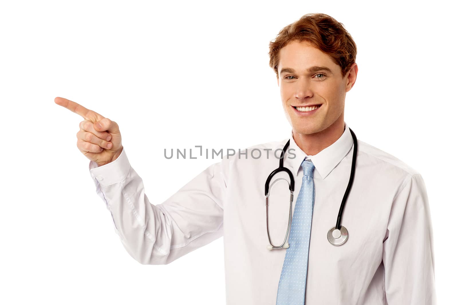Young male doctor pointing away