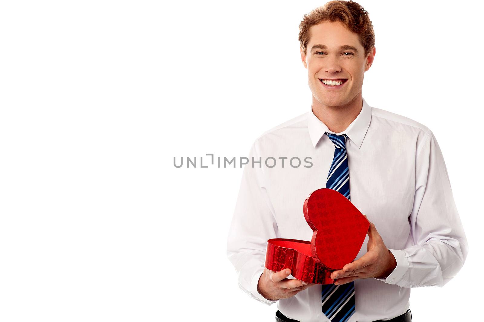 Happy businessman opened his heart shaped gift box