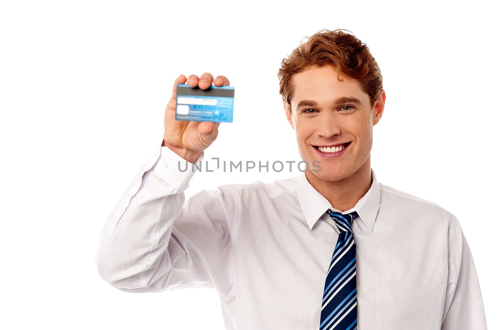 Smiling male executive showing new credit card