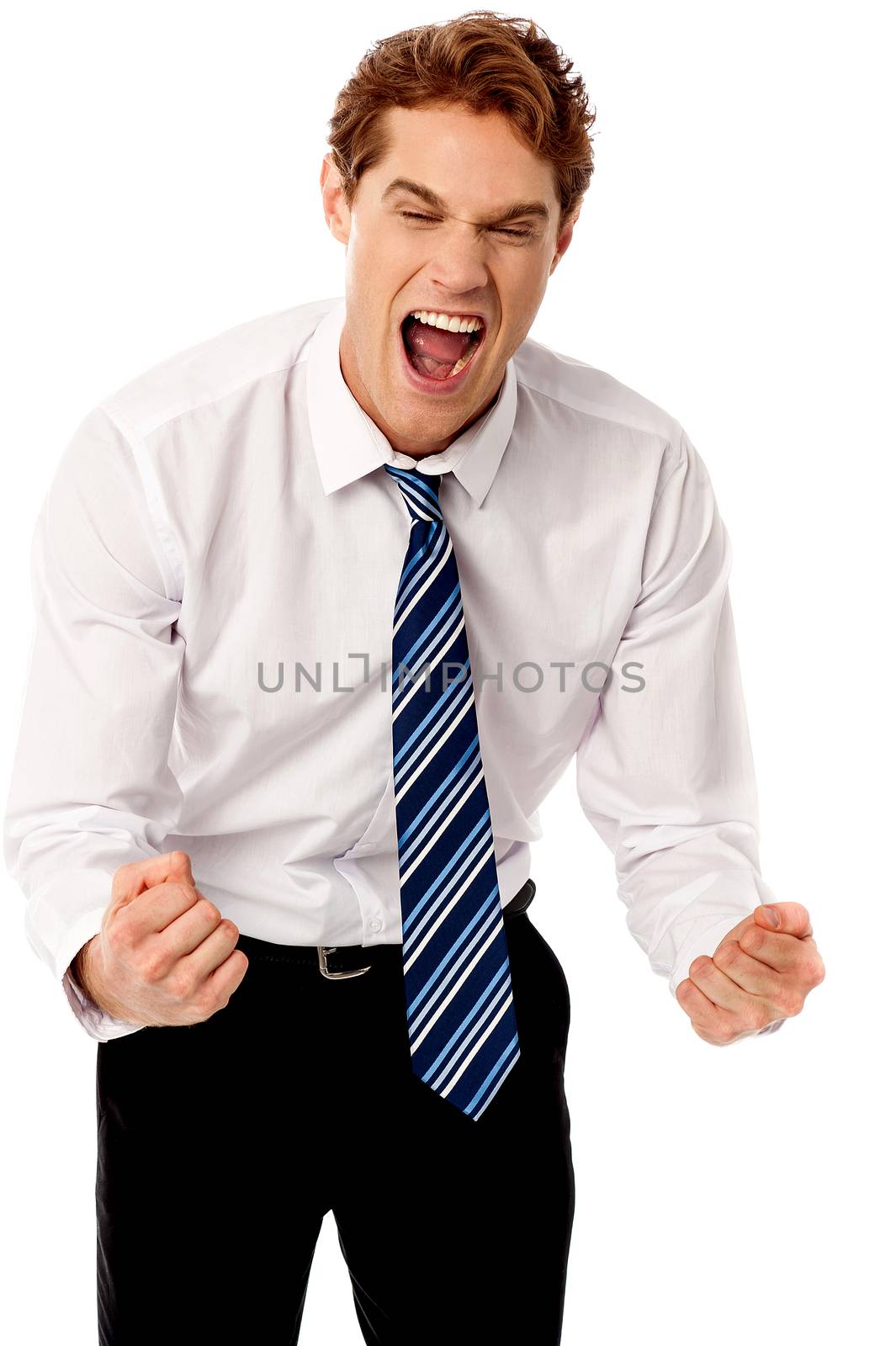 Excited corporate male clenching his fists
