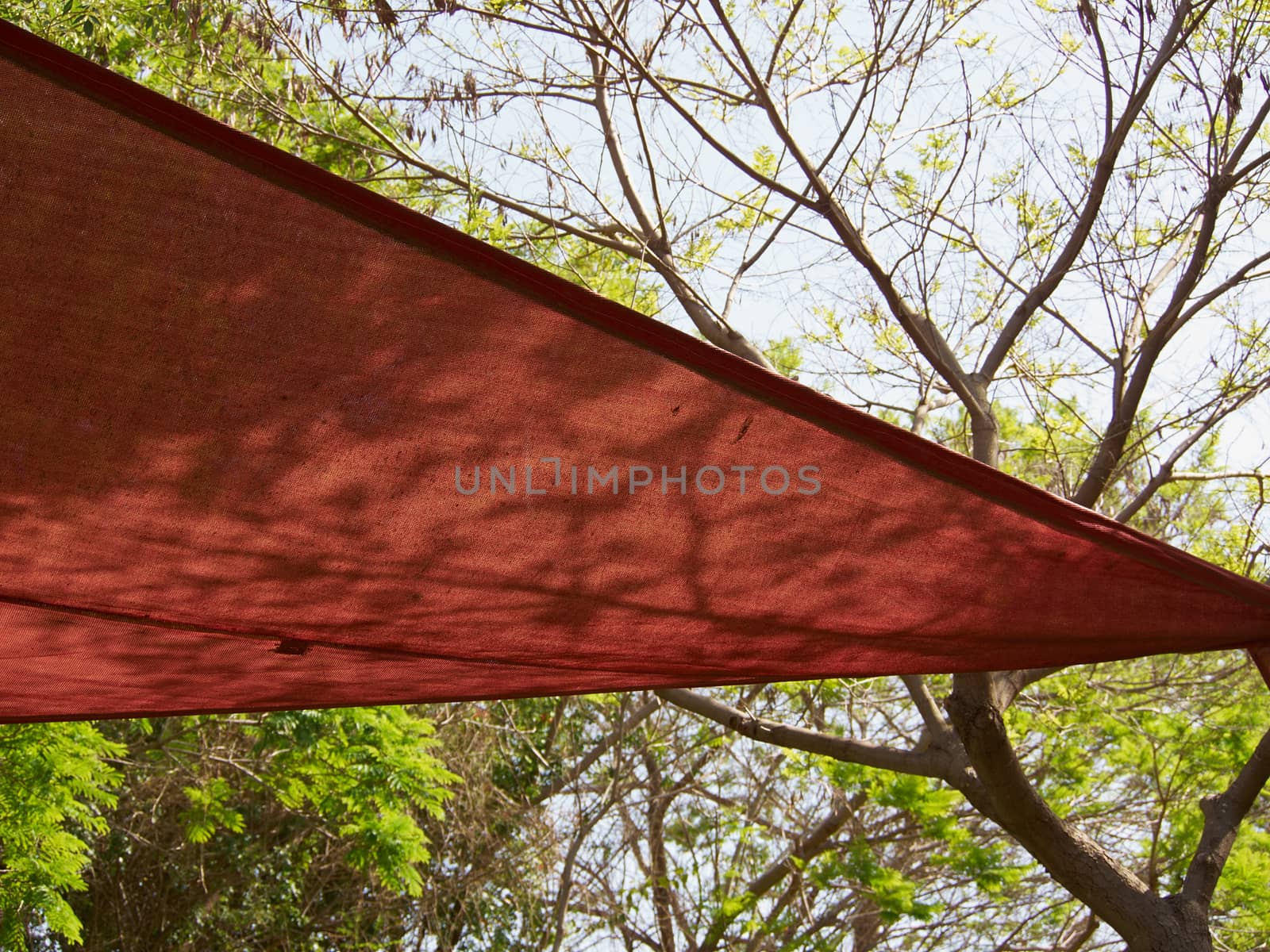 Colorful shade net shaped like a triangle in a park