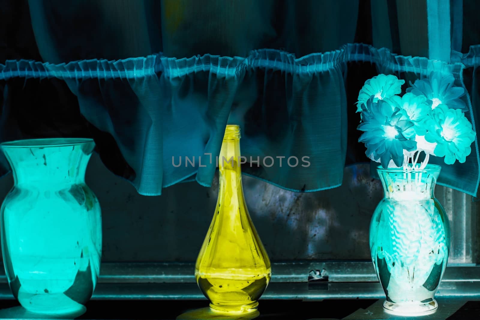 flowers in the vase with curtain background