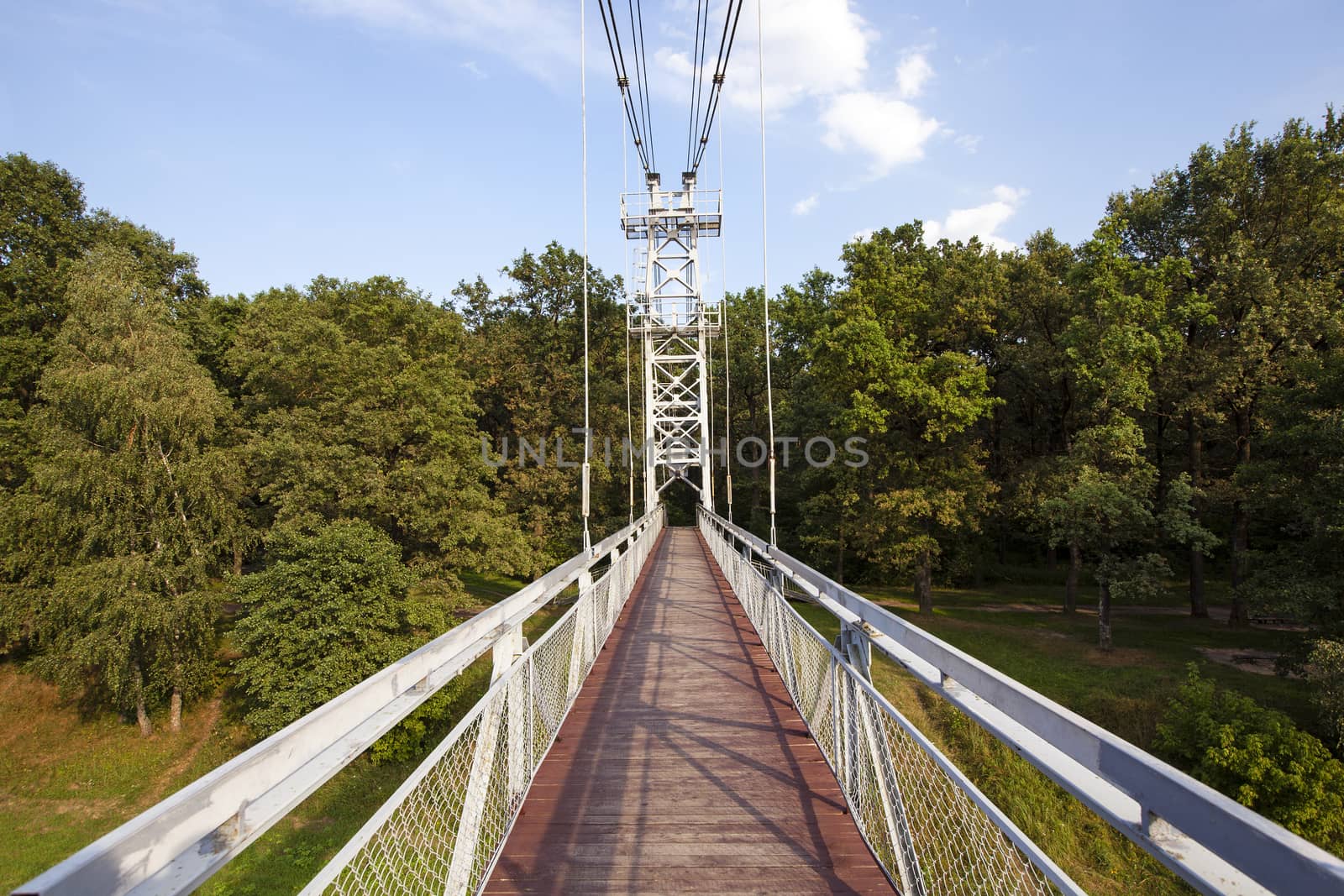   suspension bridge through the river Neman, intended for movement of pedestrians. Belarus, Mosty