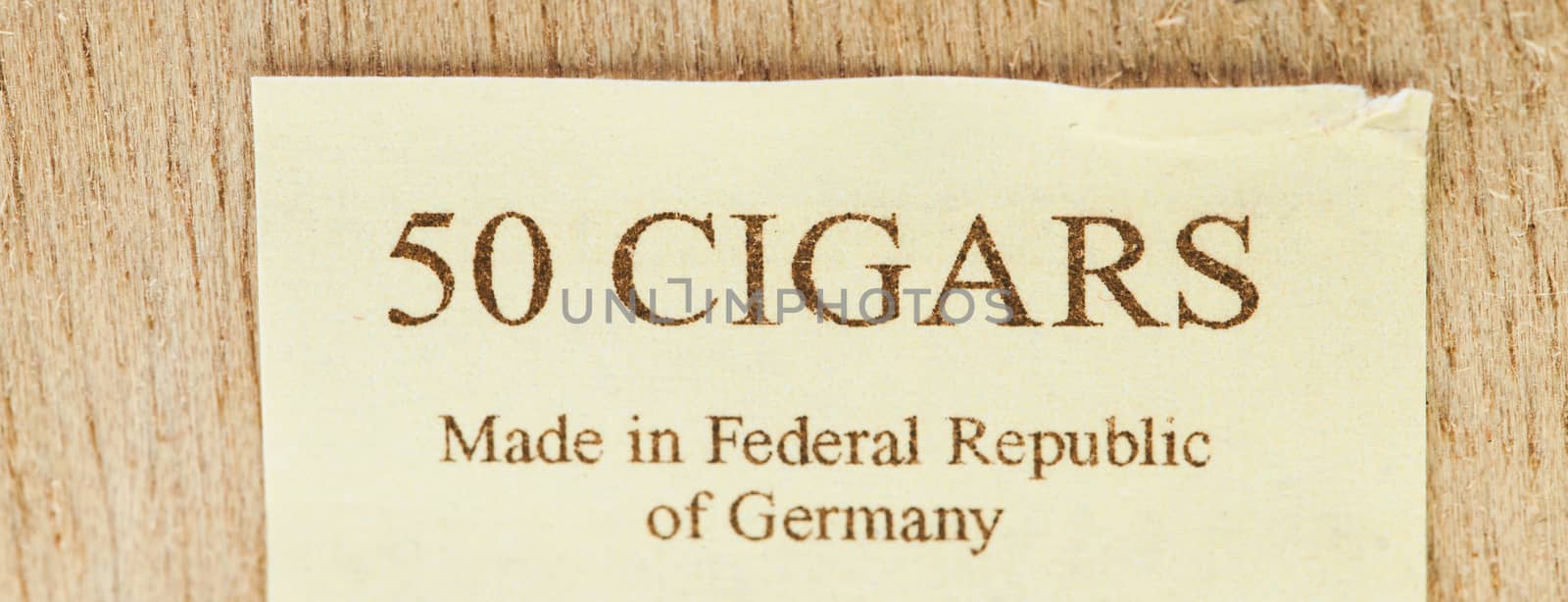   an inscription on paper from a box with cigars