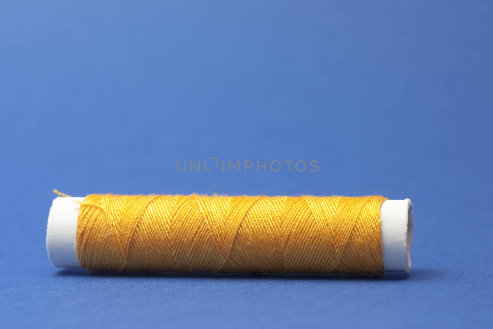 Cotton fabric yellow on blue background