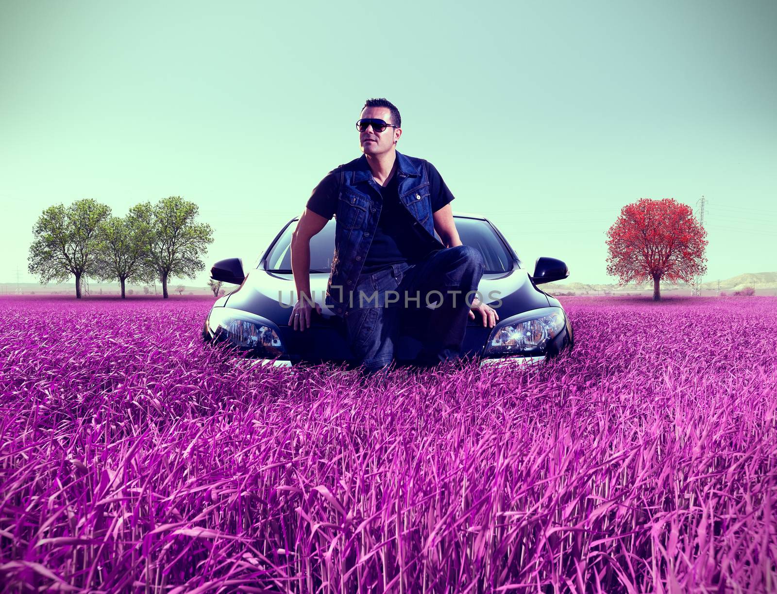 Surreal landscape and man portrait and his car.Leisure and recreation.Car concept
