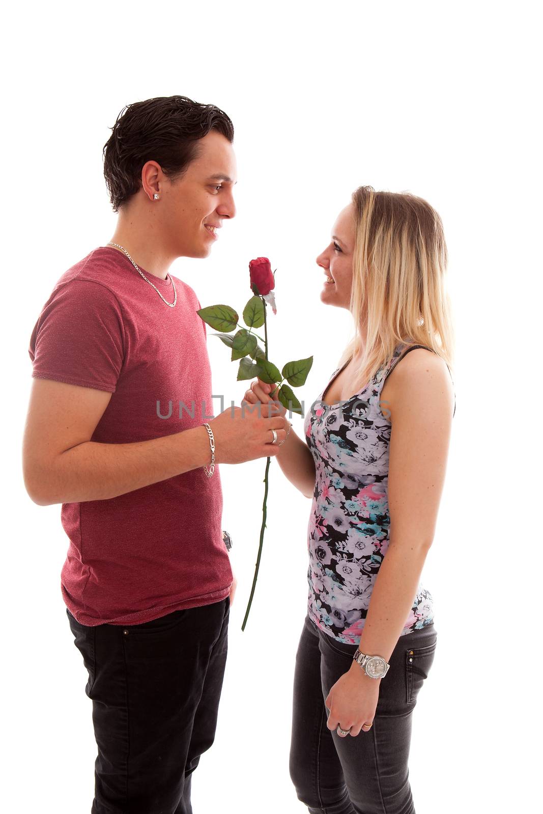 Girl is happy with rose giving by boyfriend over white background