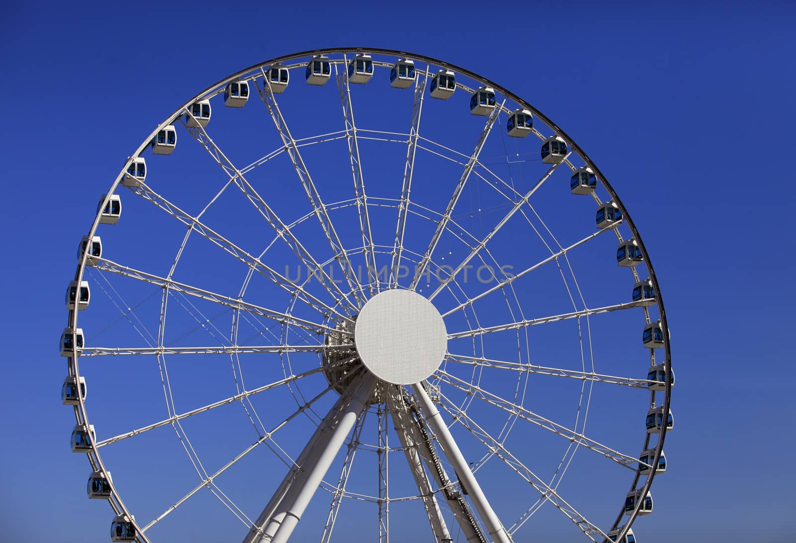 Ferris wheel on a background blue sky in HONG KONG