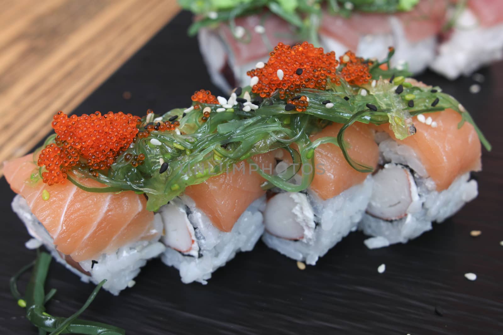 salmon sushi on ceramic plate