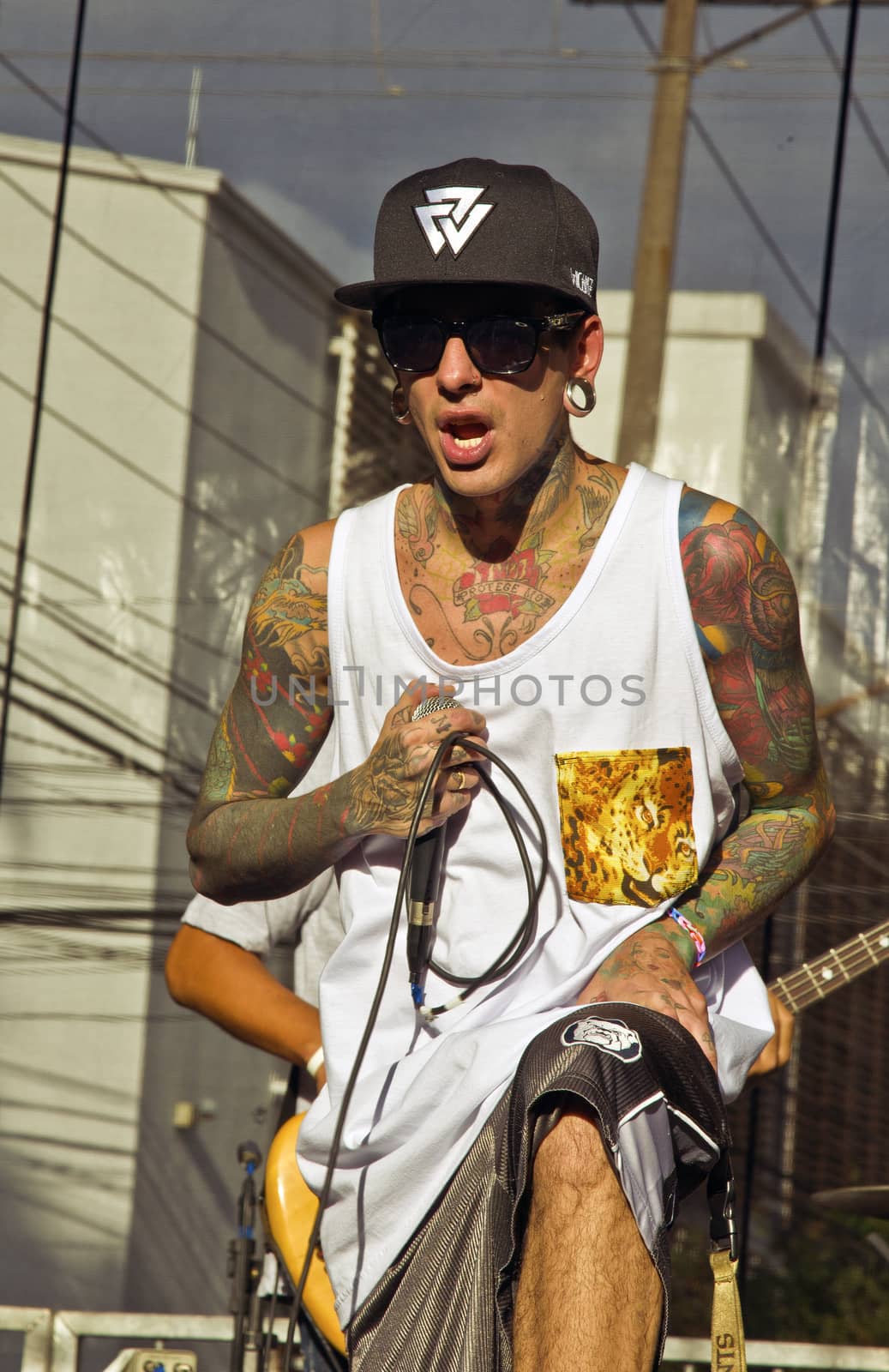 SAO PAULO, BRAZIL - MAY 17, 2015: An unidentified musician  singing rap on the street in Sao Paulo, Brazil. 