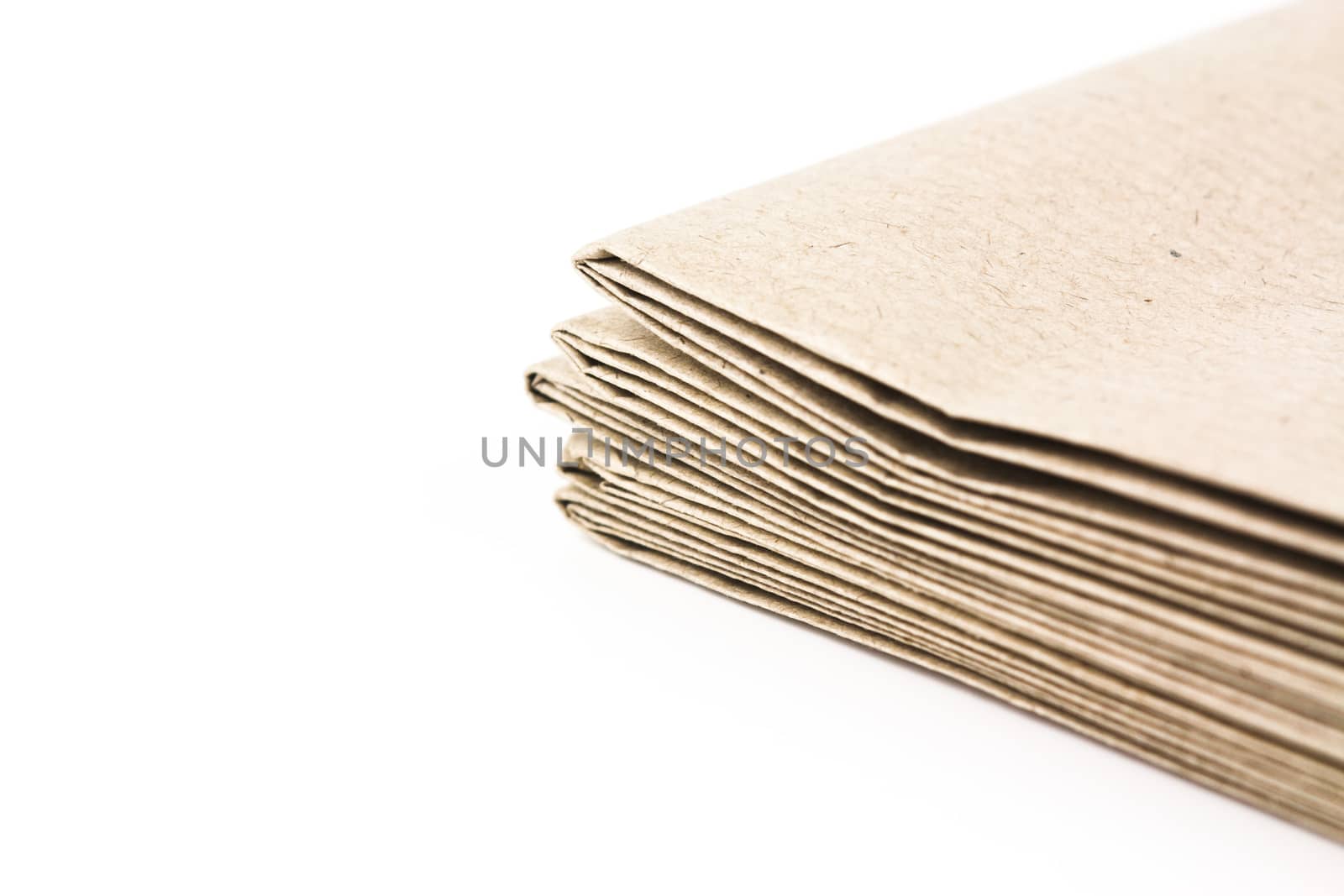 Stack of folded up brown parcel paper