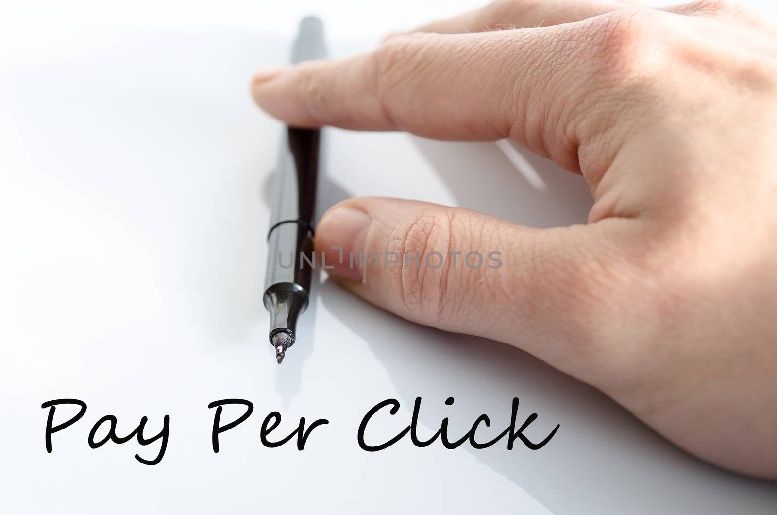 Pen in the hand isolated over white background Pay per click concept