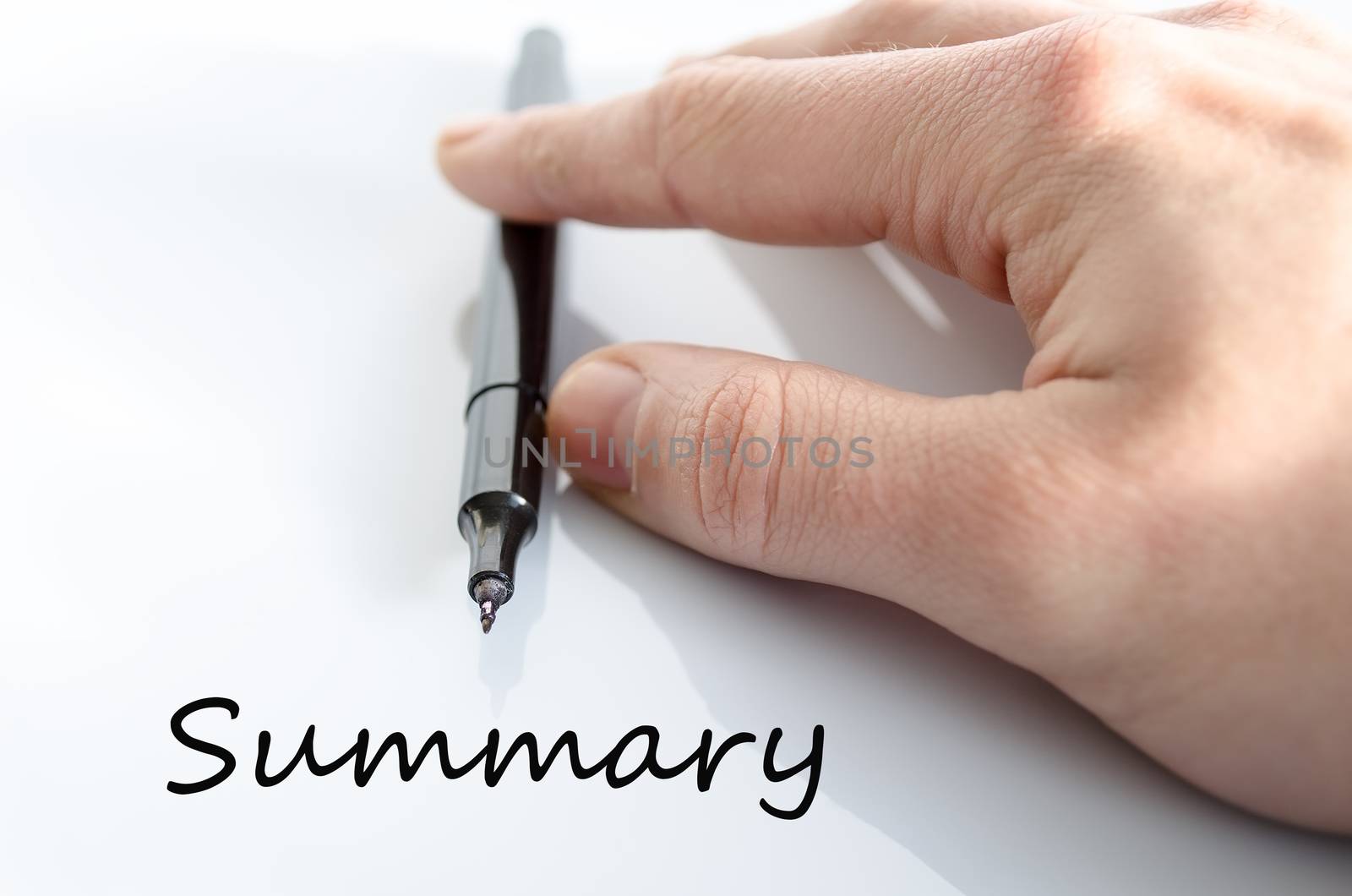 Pen in the hand isolated over white background Summary concept