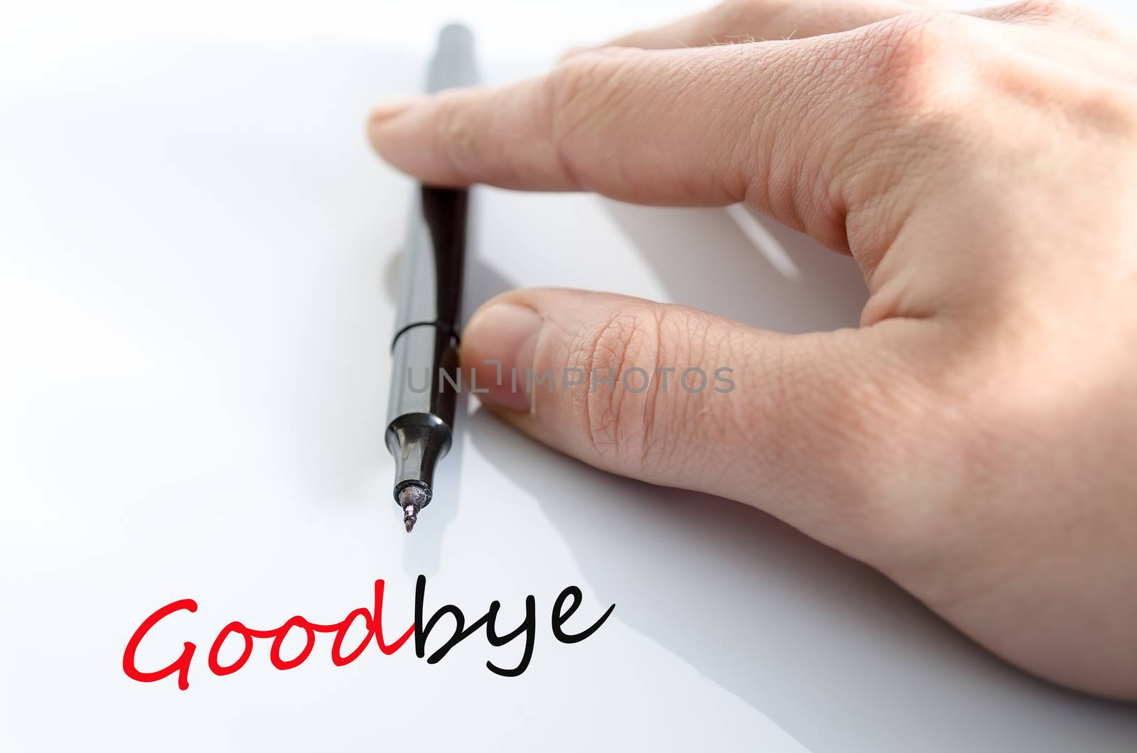Pen in the hand isolated over white background Goodbye concept