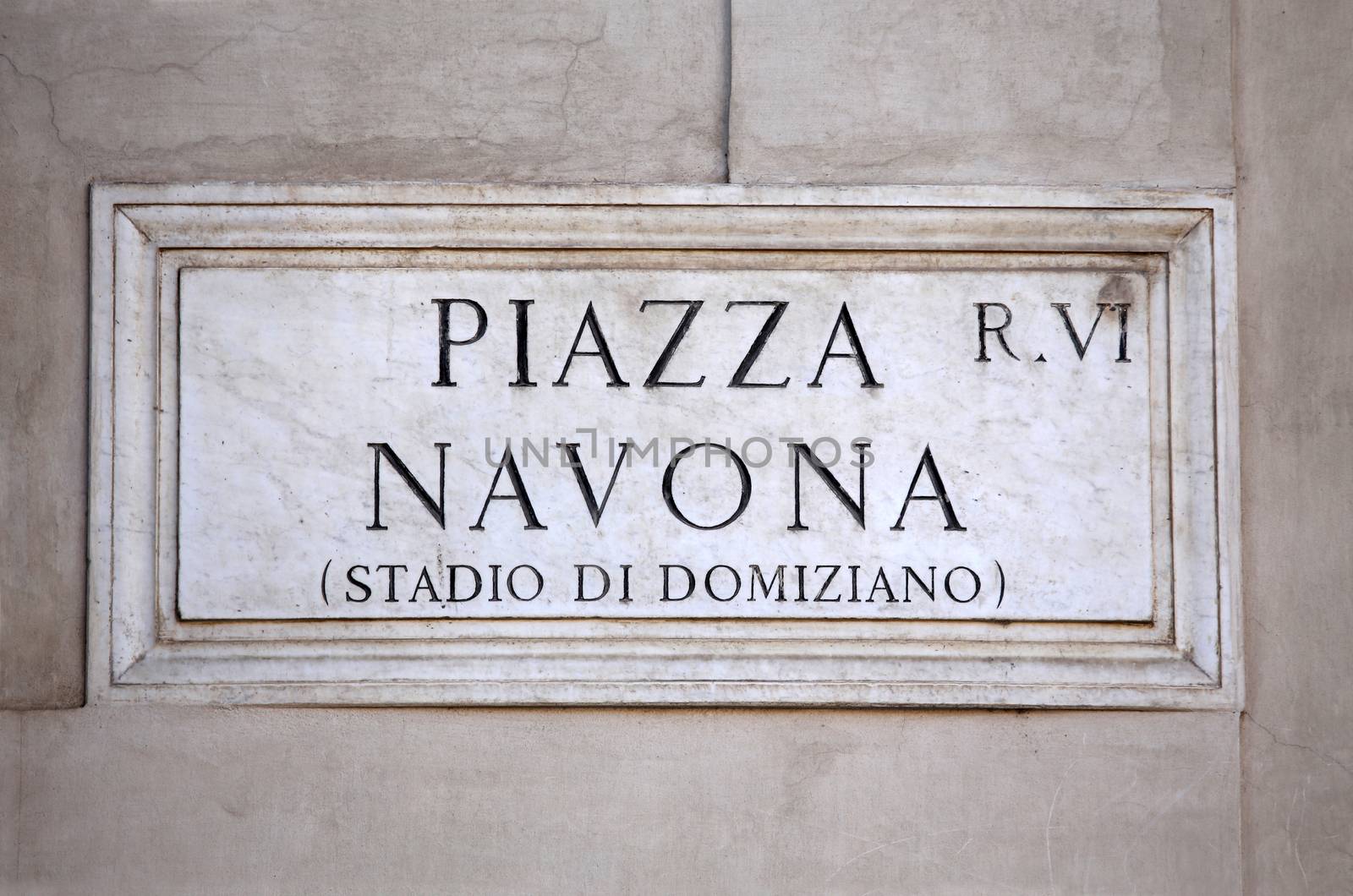 Piazza Navona sign on building wall in Rome, Italy