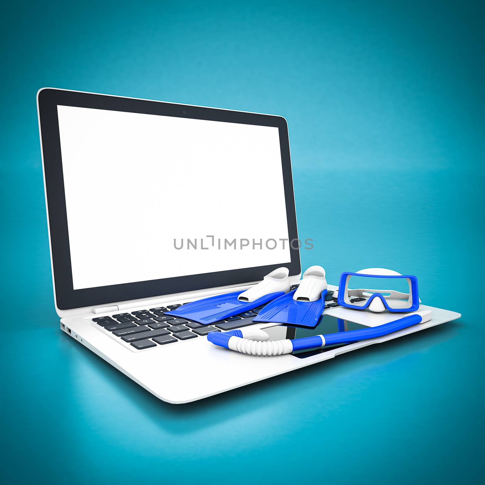 flippers, mask and snorkel and white laptop on a blue background