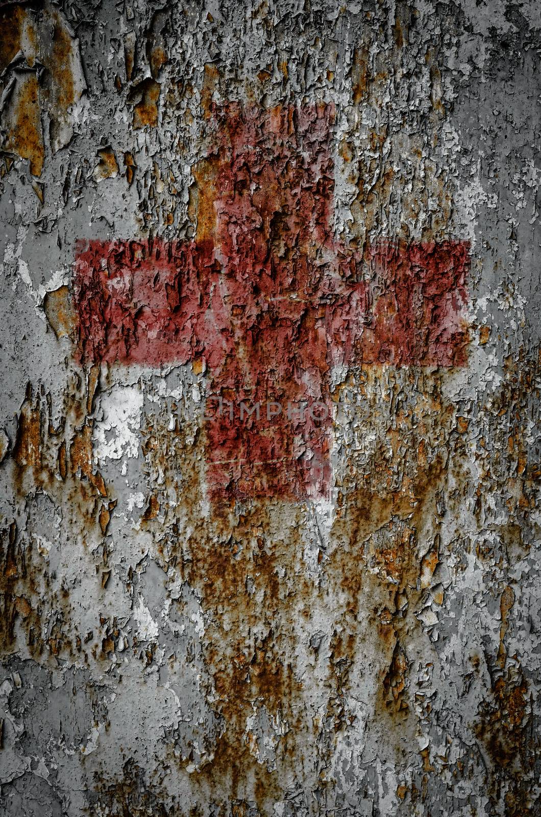 First Aid Symbol Sign On Rusty Background by mrdoomits