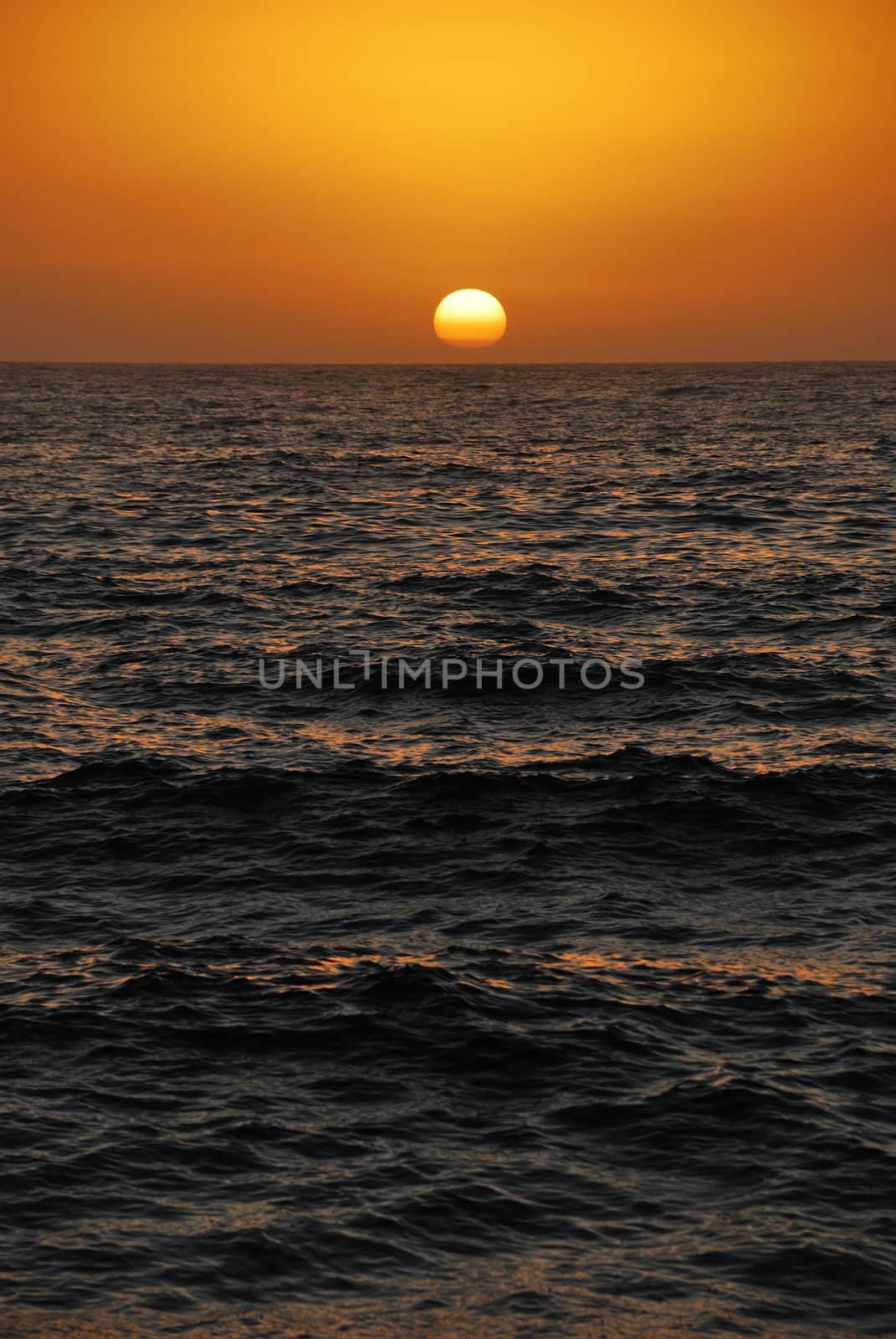 Setting sun over the ocean