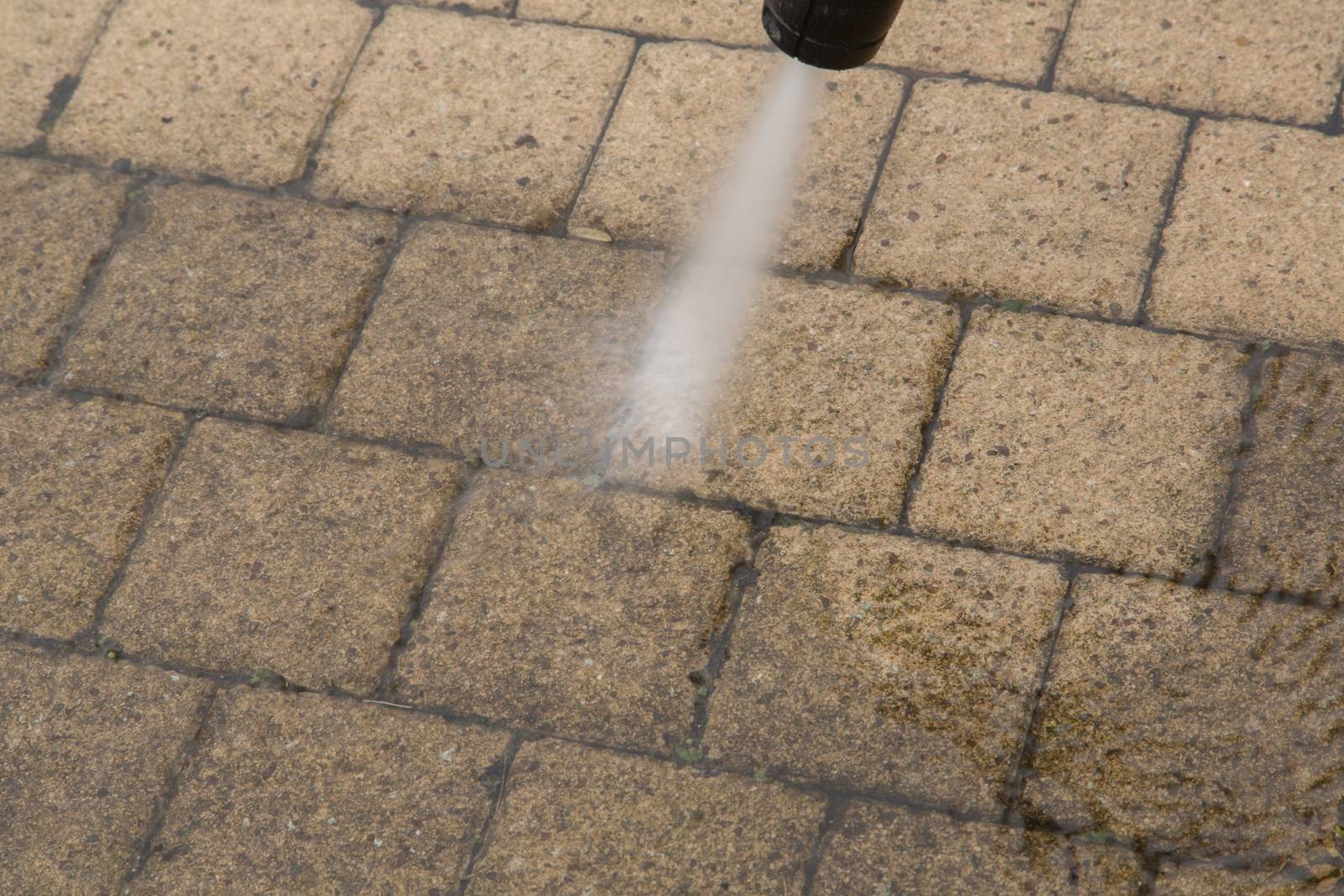 Outdoor floor cleaning with high pressure water jet