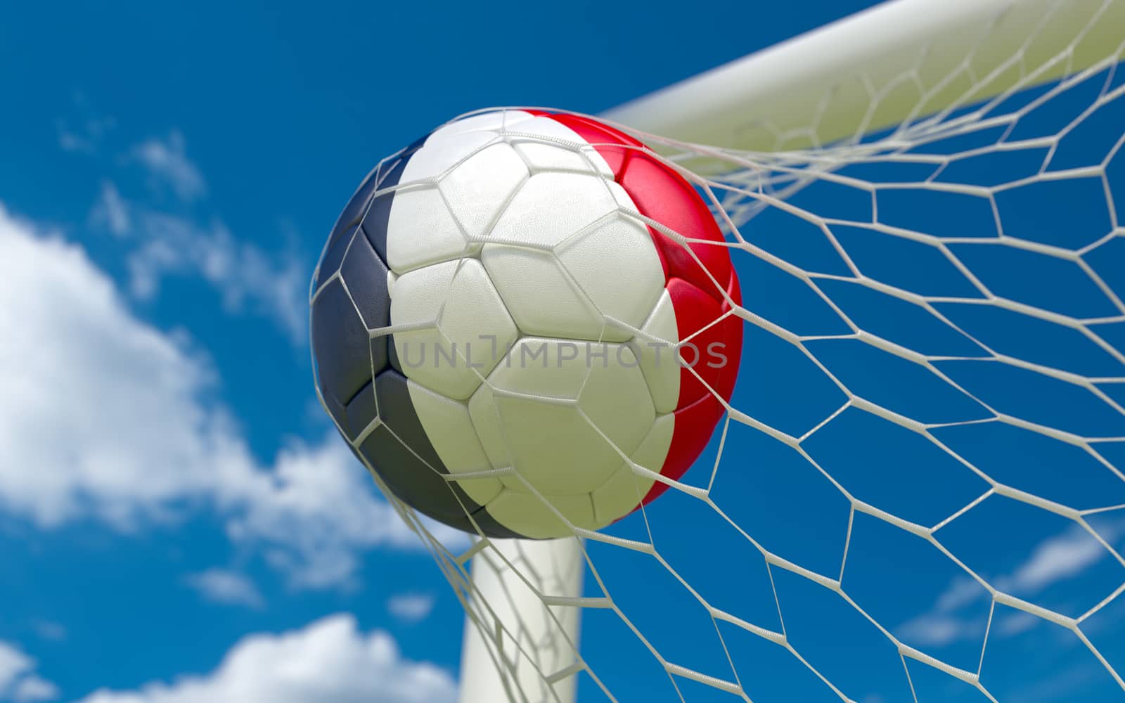France flag and soccer ball in goal net by Barbraford