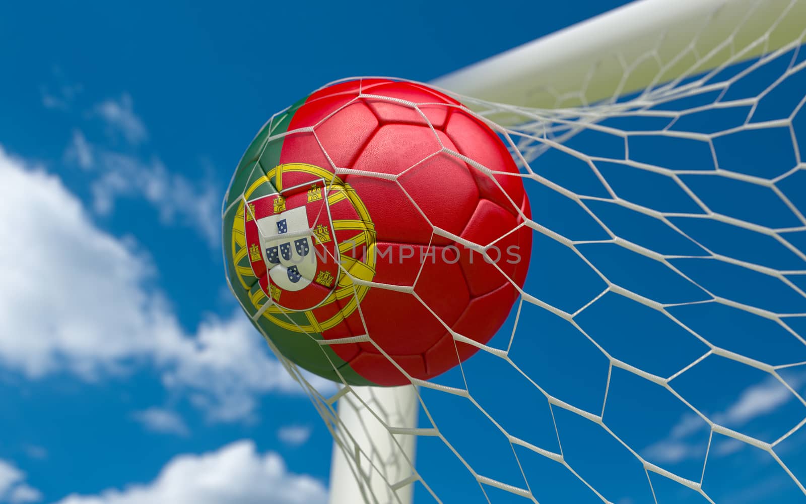 Portugal flag and soccer ball in goal net by Barbraford